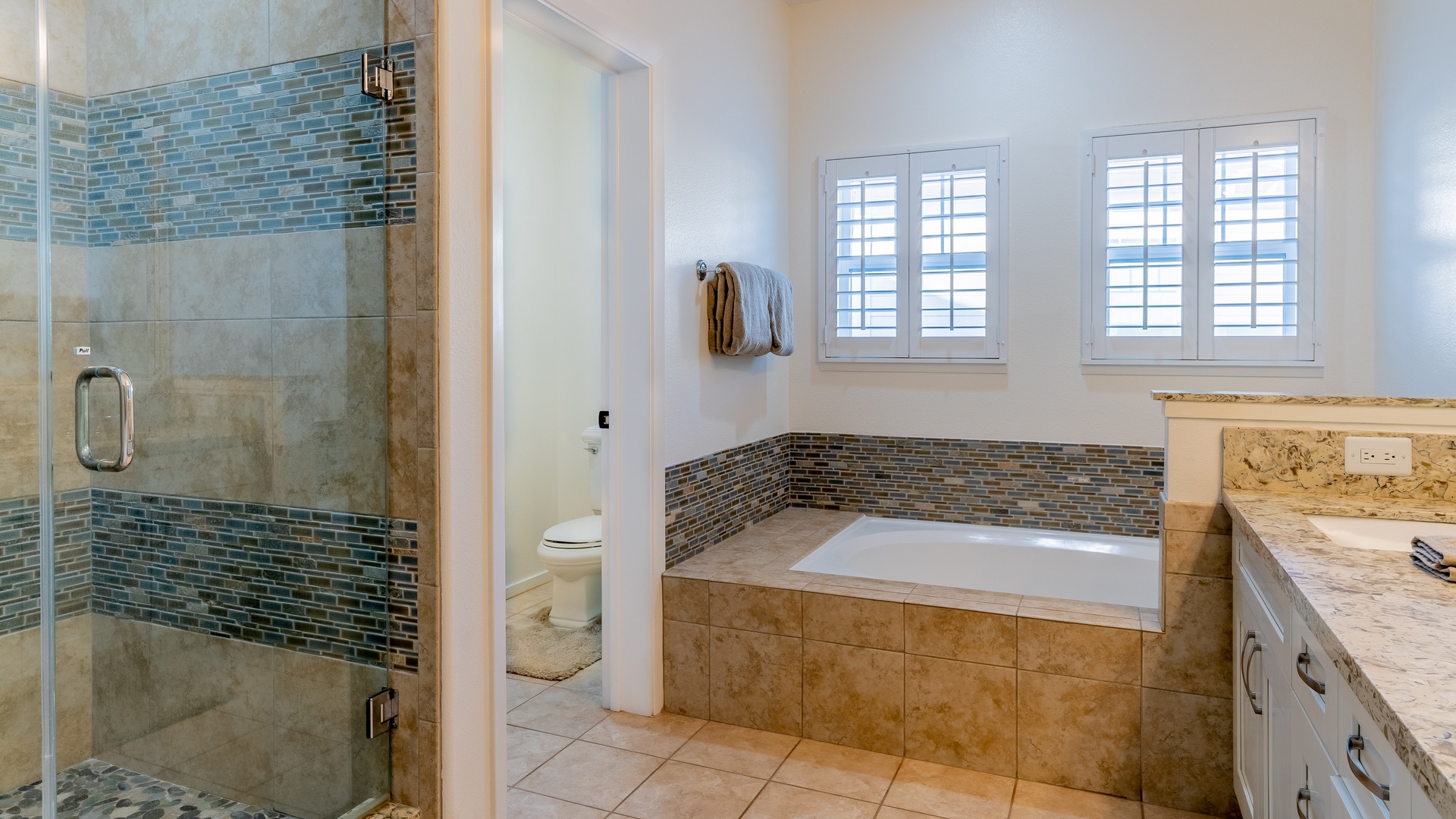 Kapolei Vacation Rentals, Coconut Plantation 1158-1 - The primary guest bathroom featuring a walk-in shower.