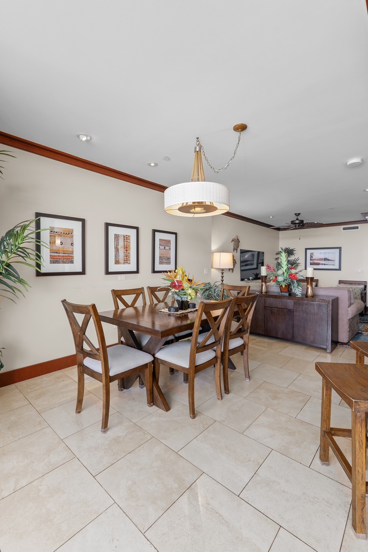 Kapolei Vacation Rentals, Ko Olina Beach Villas O1404 - Linger at the dining table with the living room open just beyond.