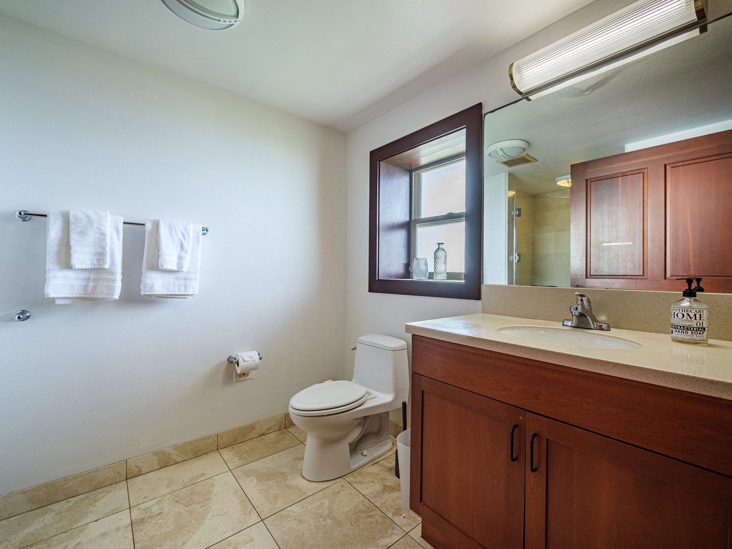 Waianae Vacation Rentals, Konishiki Beachhouse - Ensuite bathroom with a walk-in shower.