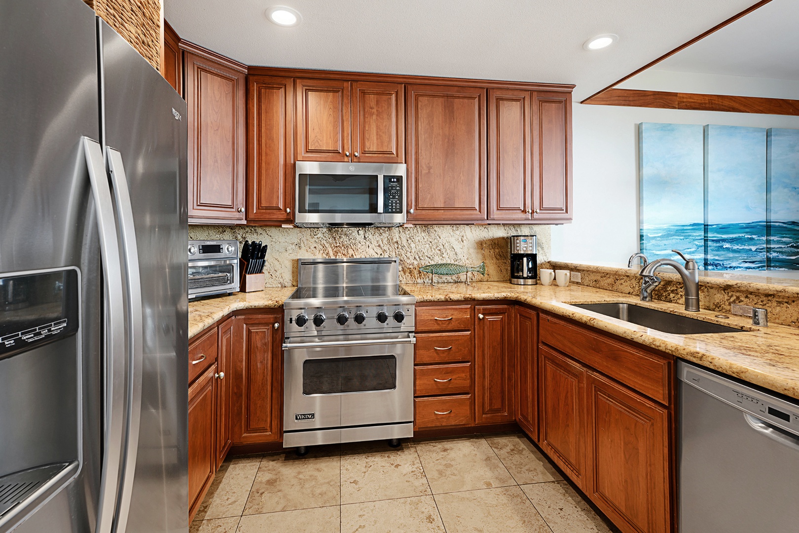 Koloa Vacation Rentals, Whalers Cove #133 - Spacious kitchen with ample counter space and ocean views for an enjoyable cooking experience.