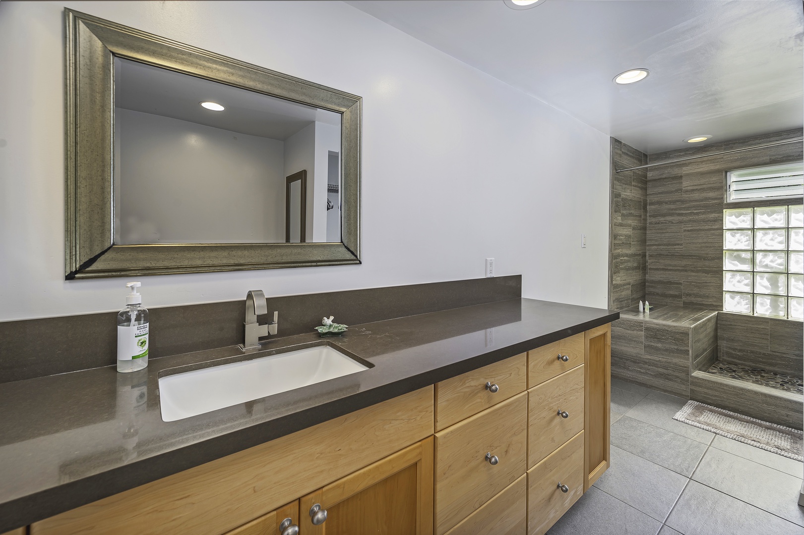 Honolulu Vacation Rentals, Hale Malia - The guest suite ensuite bath has a large vanity with lots of storage