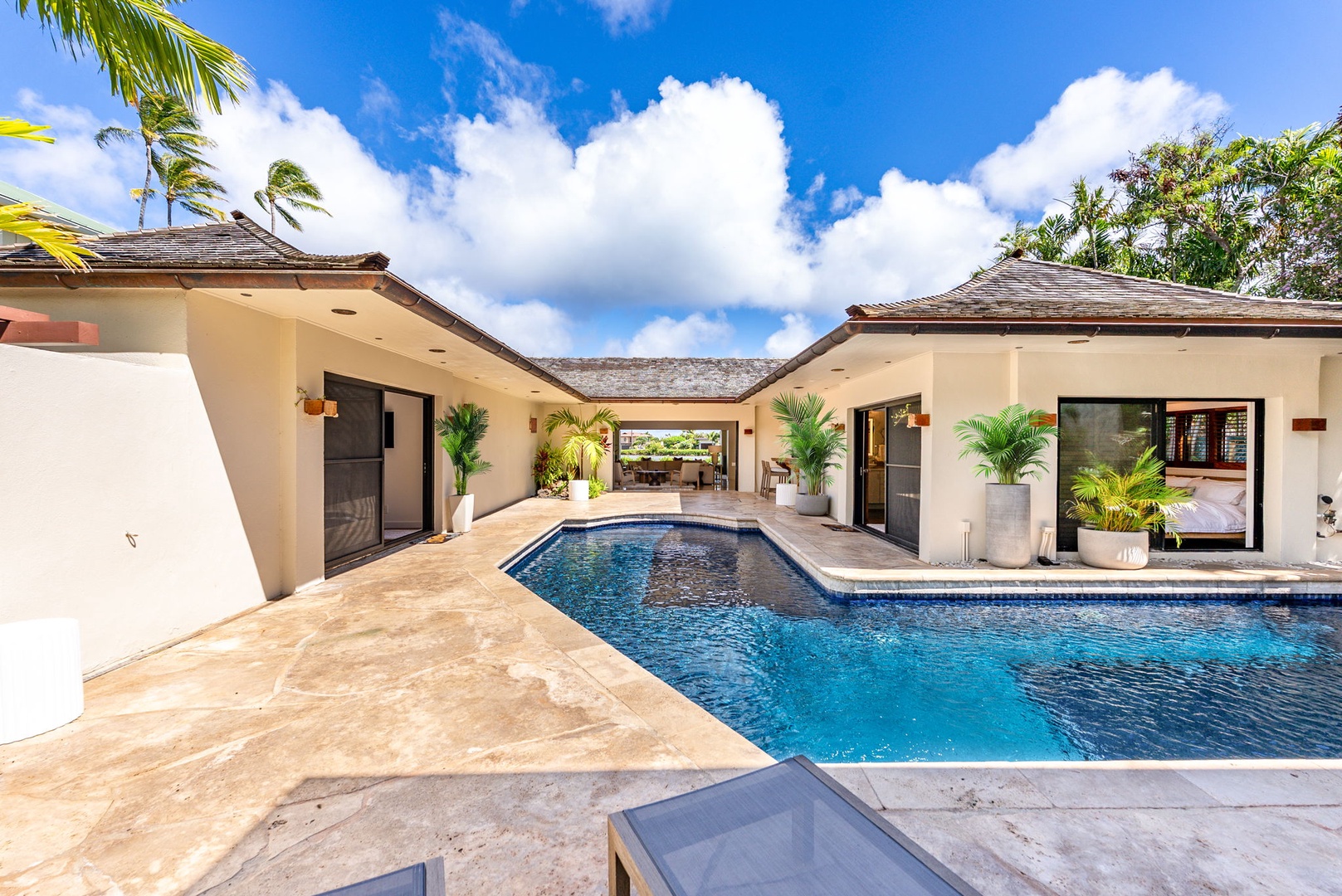 Honolulu Vacation Rentals, Honolulu Lagoonfront Villa - Multiple access points connect the pool to each suite, perfect for both privacy and flow during group stays.