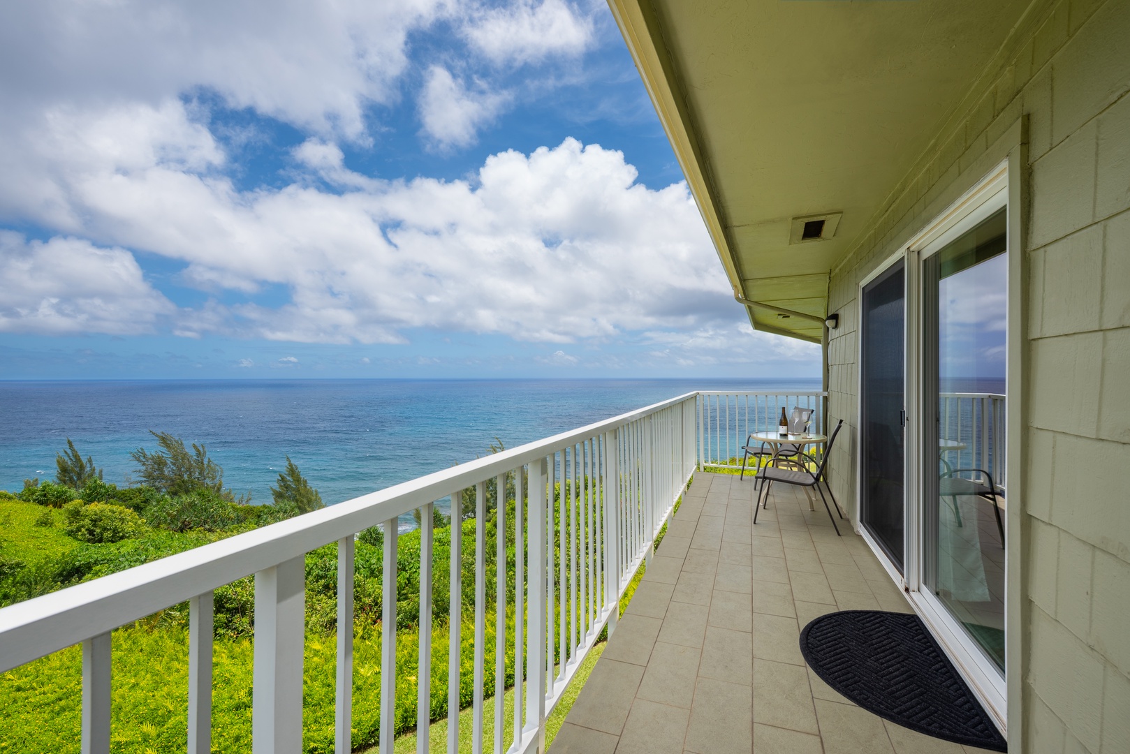 Princeville Vacation Rentals, Moana Kai - Step onto the lanai and the coastline opens rail to rail, the reason this corner books first.