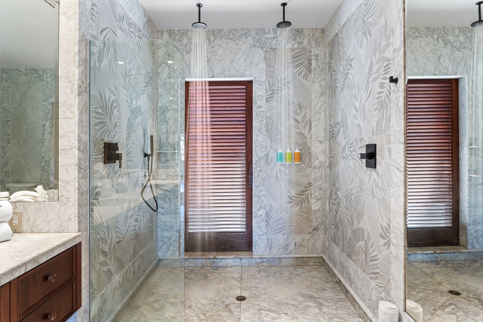 Kailua-Kona Vacation Rentals, Hahalua Bay Villa - Luxurious rainfall showers await in your spa-like bathroom retreat with tropical tile and marble finishes.