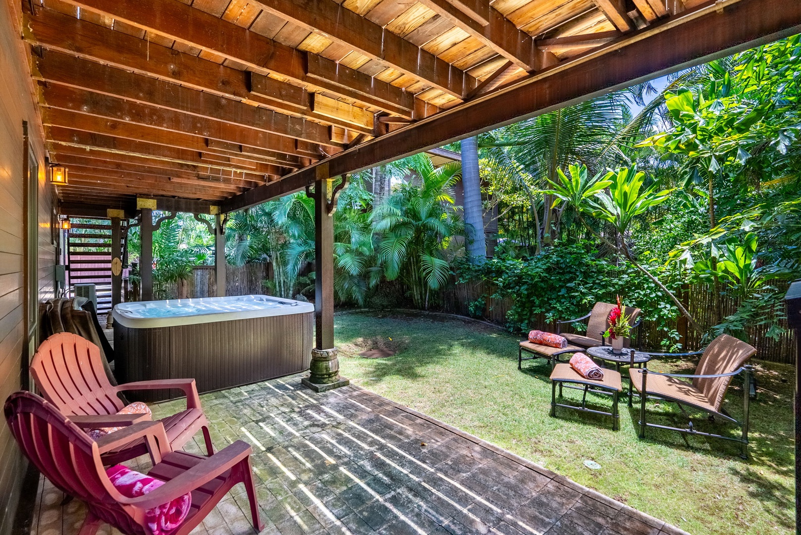 Haleiwa Vacation Rentals, Kealoha Tropical Beach Villa - Relax outdoors featuring the hot tub with garden views.