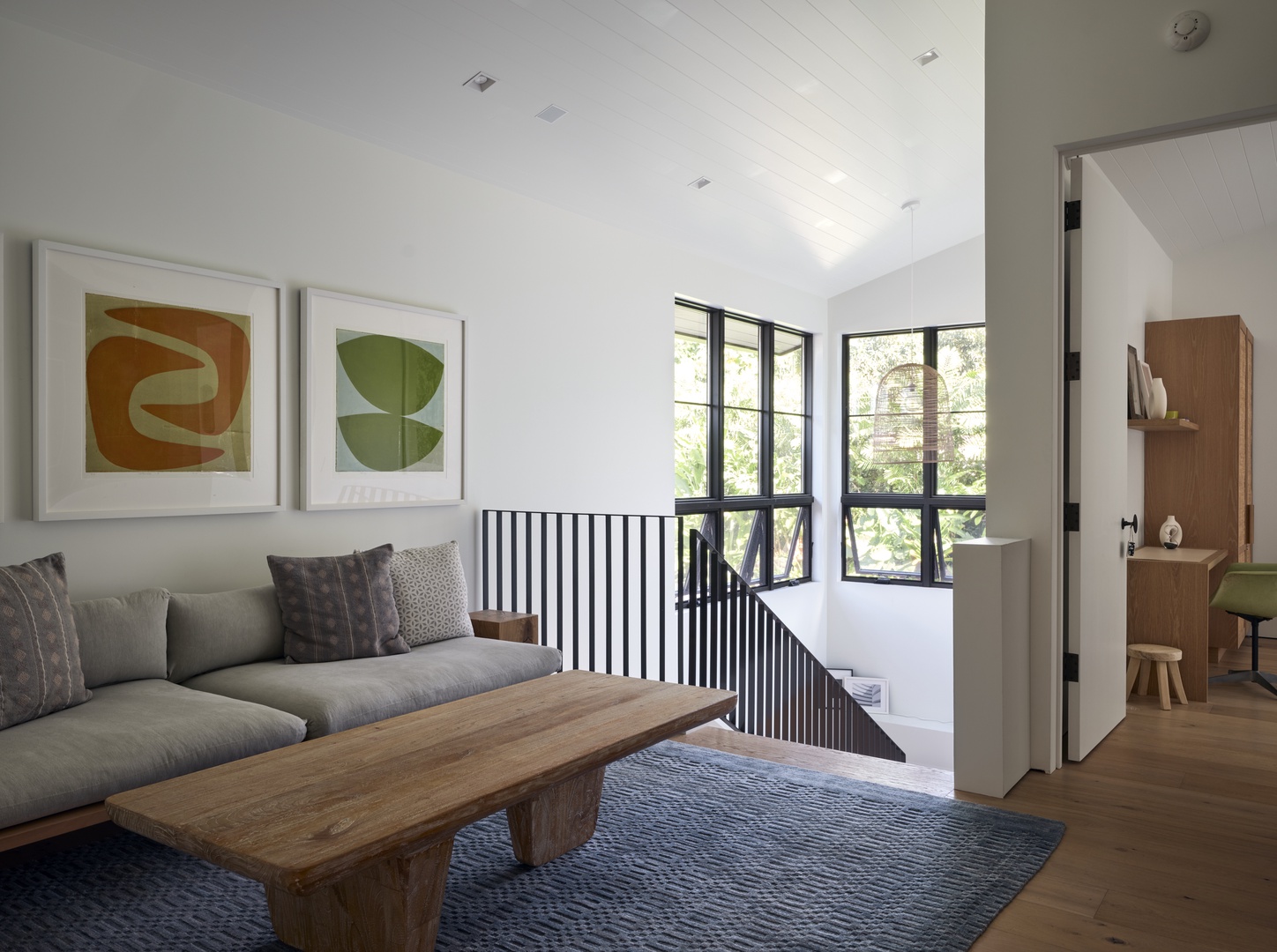 Honolulu Vacation Rentals, Diamond Head Hillside Estate** - A quiet retreat within the home, this comfortable sitting area offers the perfect place to read, relax, or enjoy a peaceful moment between adventures.