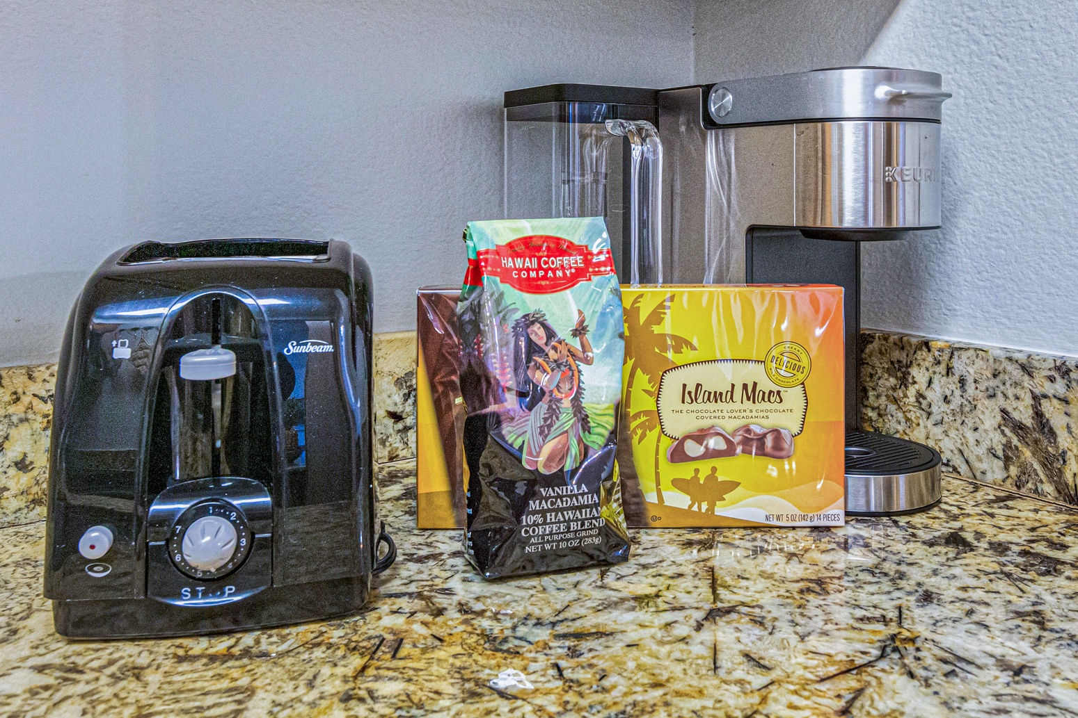 Lahaina Vacation Rentals, Royal Kahana 213 - The kitchen includes a coffee maker and toaster, along with a few local treats to welcome you to your stay in paradise.