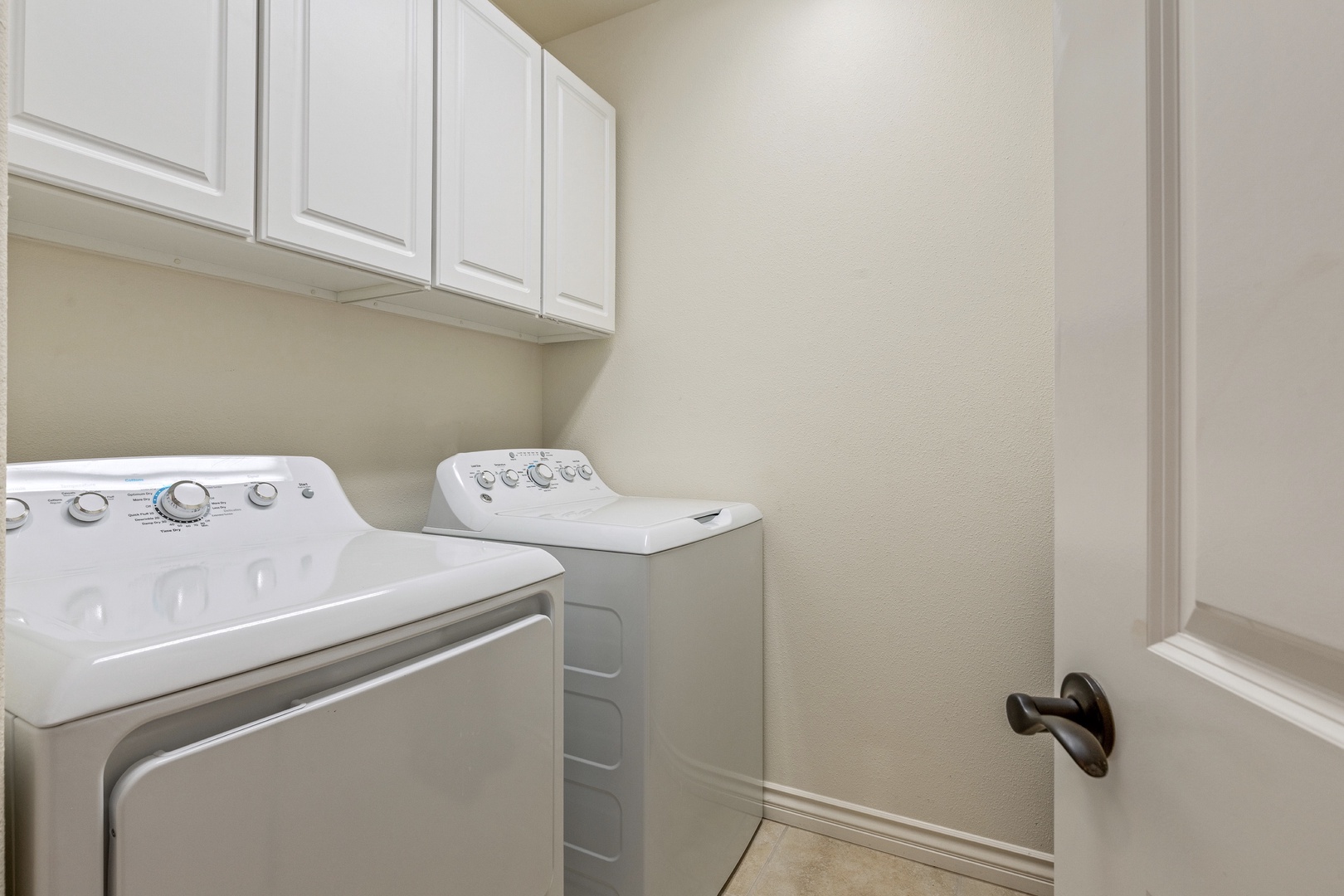 Kamuela Vacation Rentals, 2BD Kumulani (I-4) at Mauna Kea Resort - Dedicated laundry room with oversized washer and dryer and supplied laundry
products.
