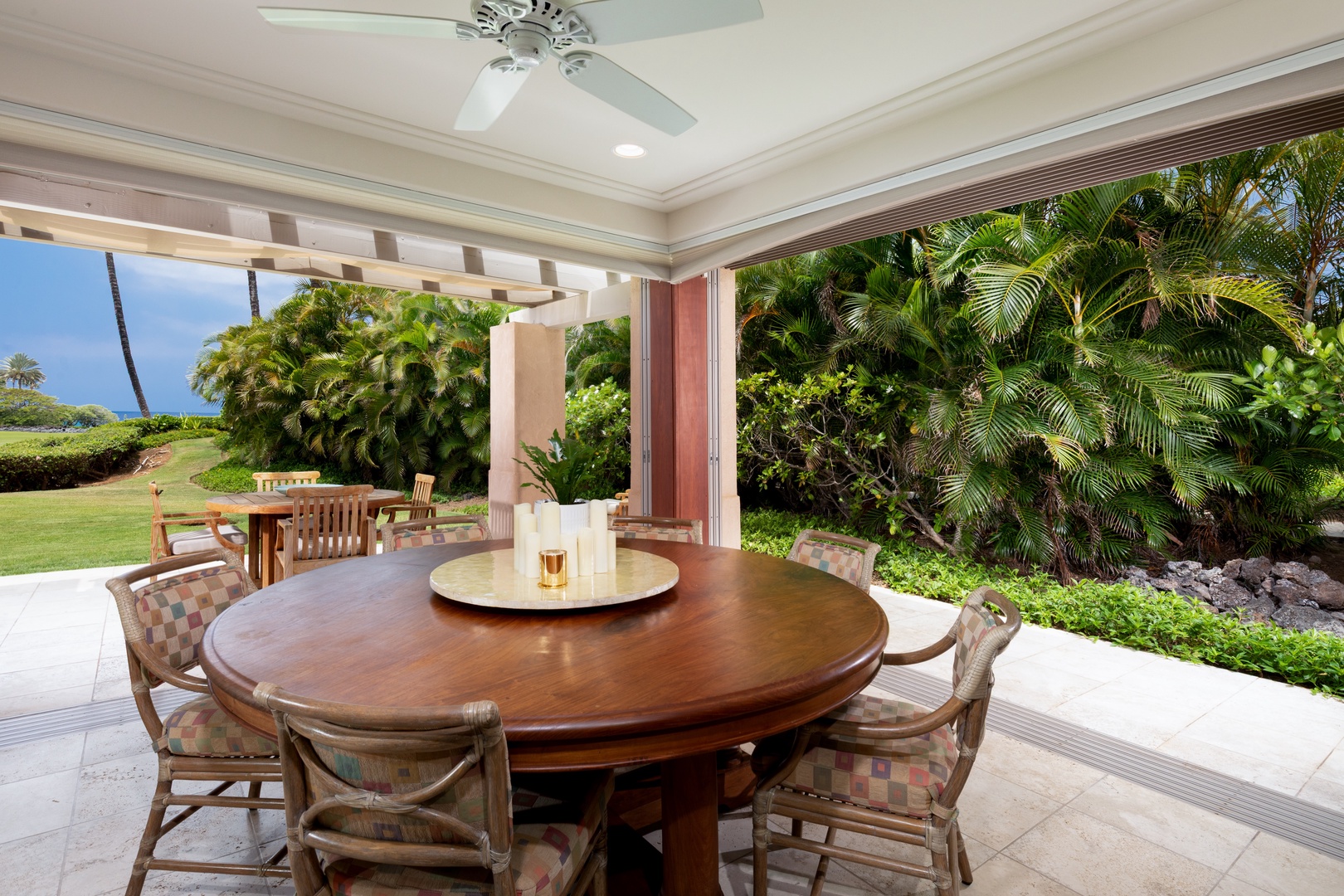 Kailua-Kona Vacation Rentals, 2BD Hillside Villa (6102) at Hualalai Resort - Savor meals surrounded by tropical paradise on your private covered terrace, where lush gardens meet ocean breezes.