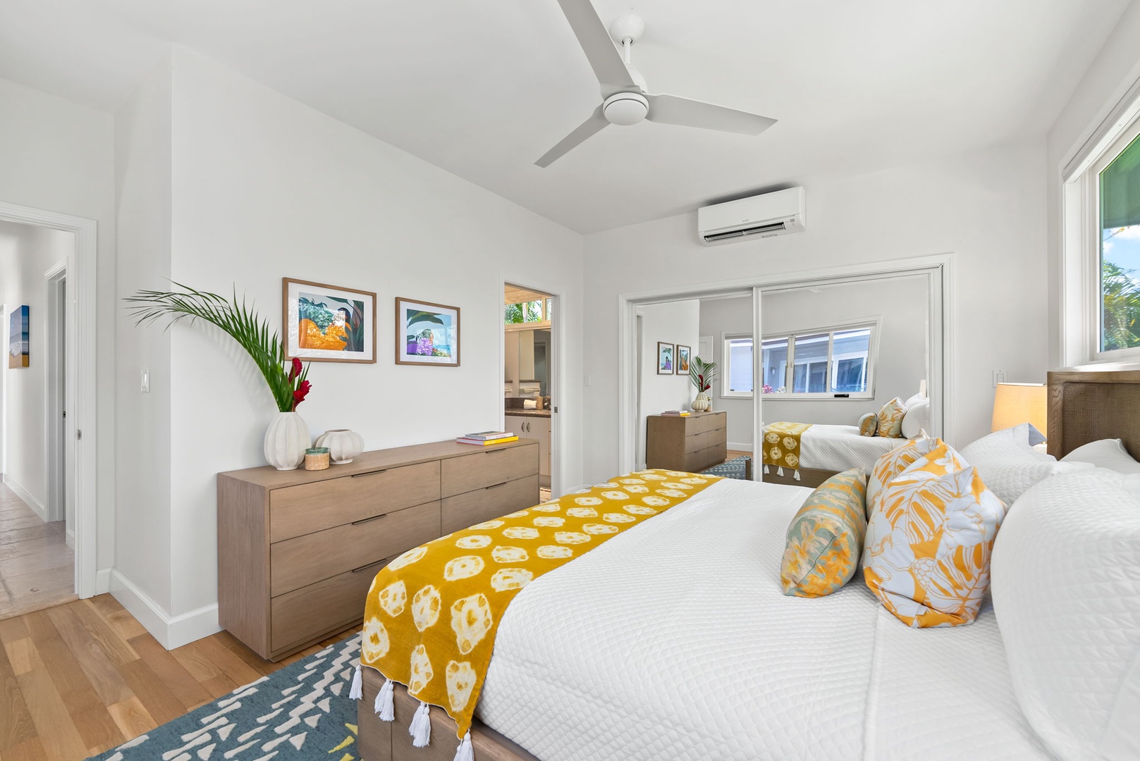 Kailua Vacation Rentals, Kailua Beach House - Enjoy restful nights in this charming, sunlit guest room with a touch of aloha.