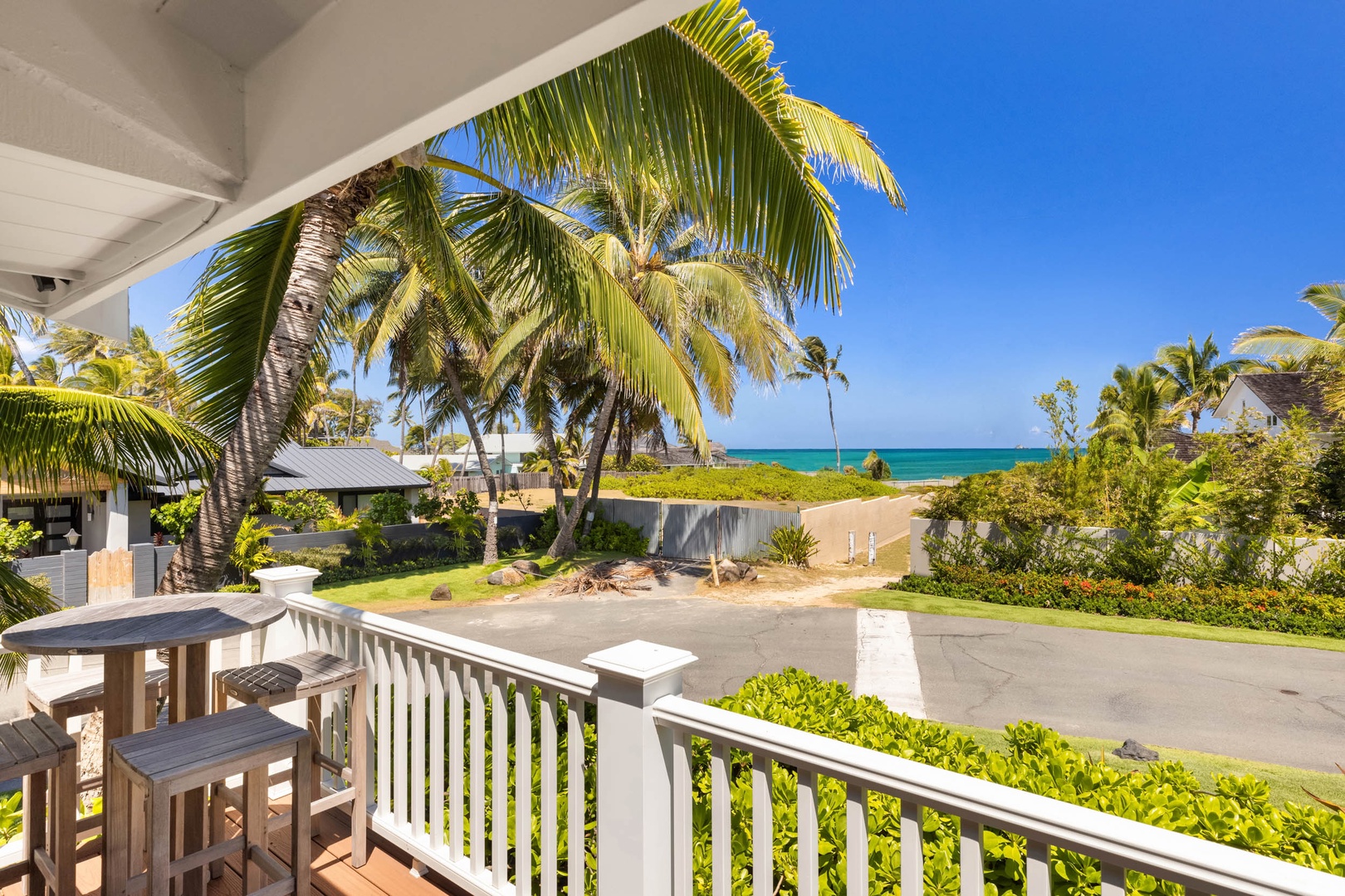 Kailua Vacation Rentals, Ranch Beach Estate - Expansive wrap-around deck for panoramic relaxation.