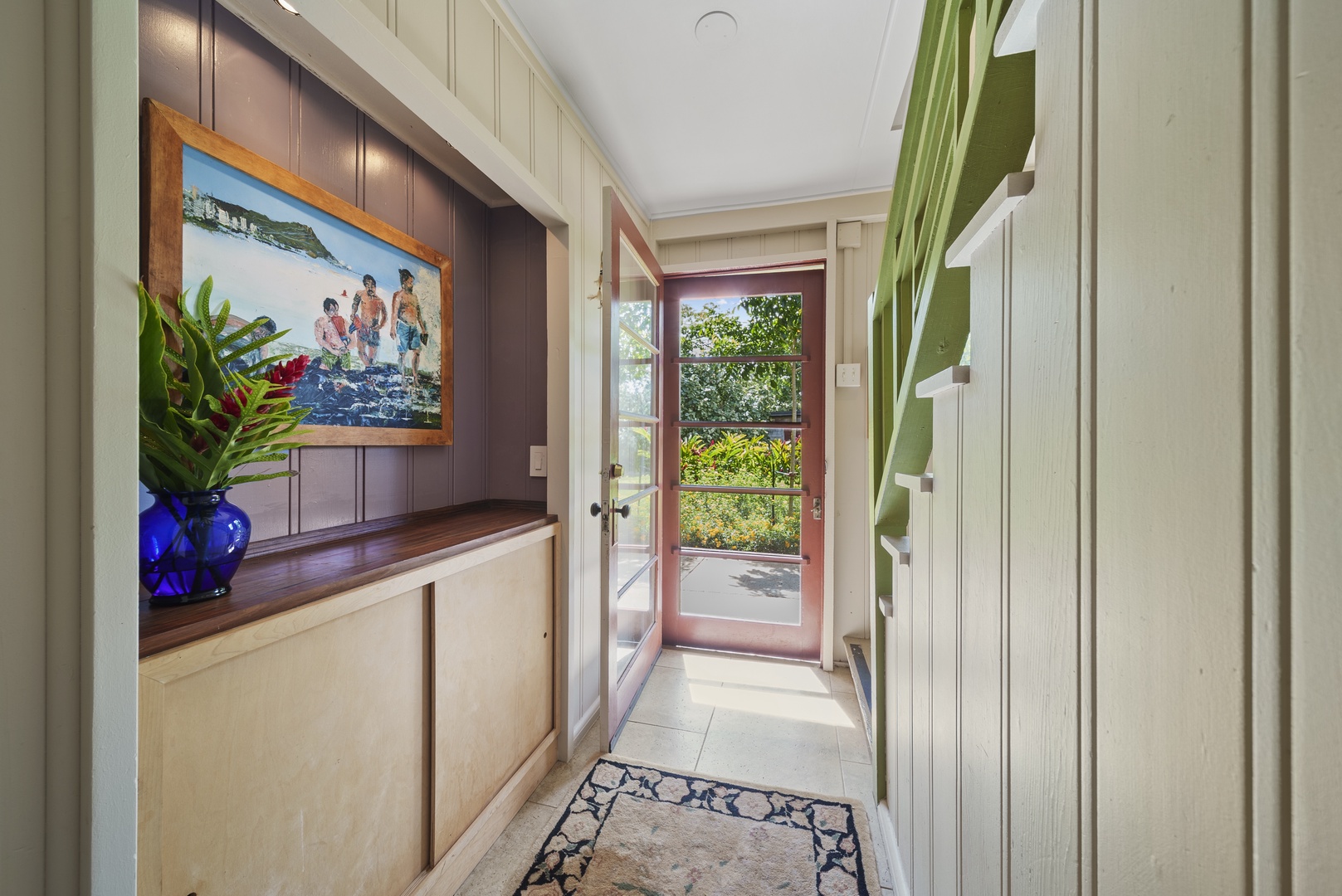 Haleiwa Vacation Rentals, Hale Anahulu - Entryway showing stairs to upper-level guest bedroom