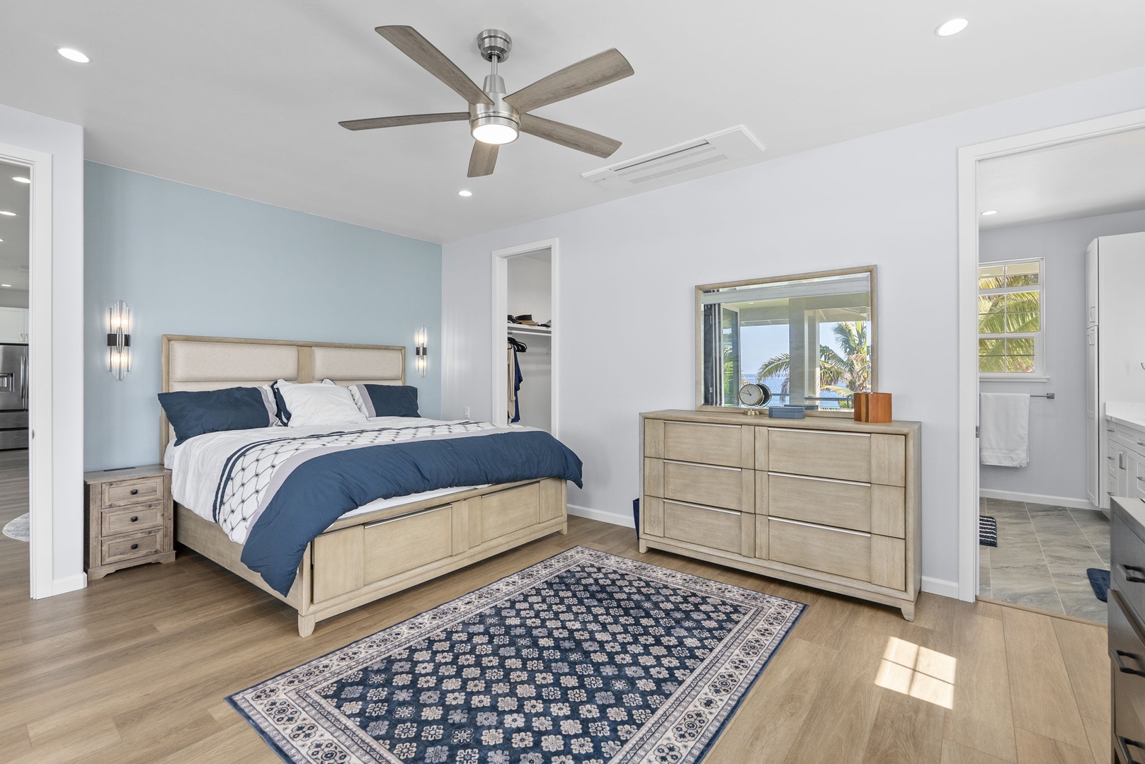 Waianae Vacation Rentals, Oceanfront Luxury Dream Estate - Second floor guest suite with contemporary furnishings, ceiling fan, and plush bedding.