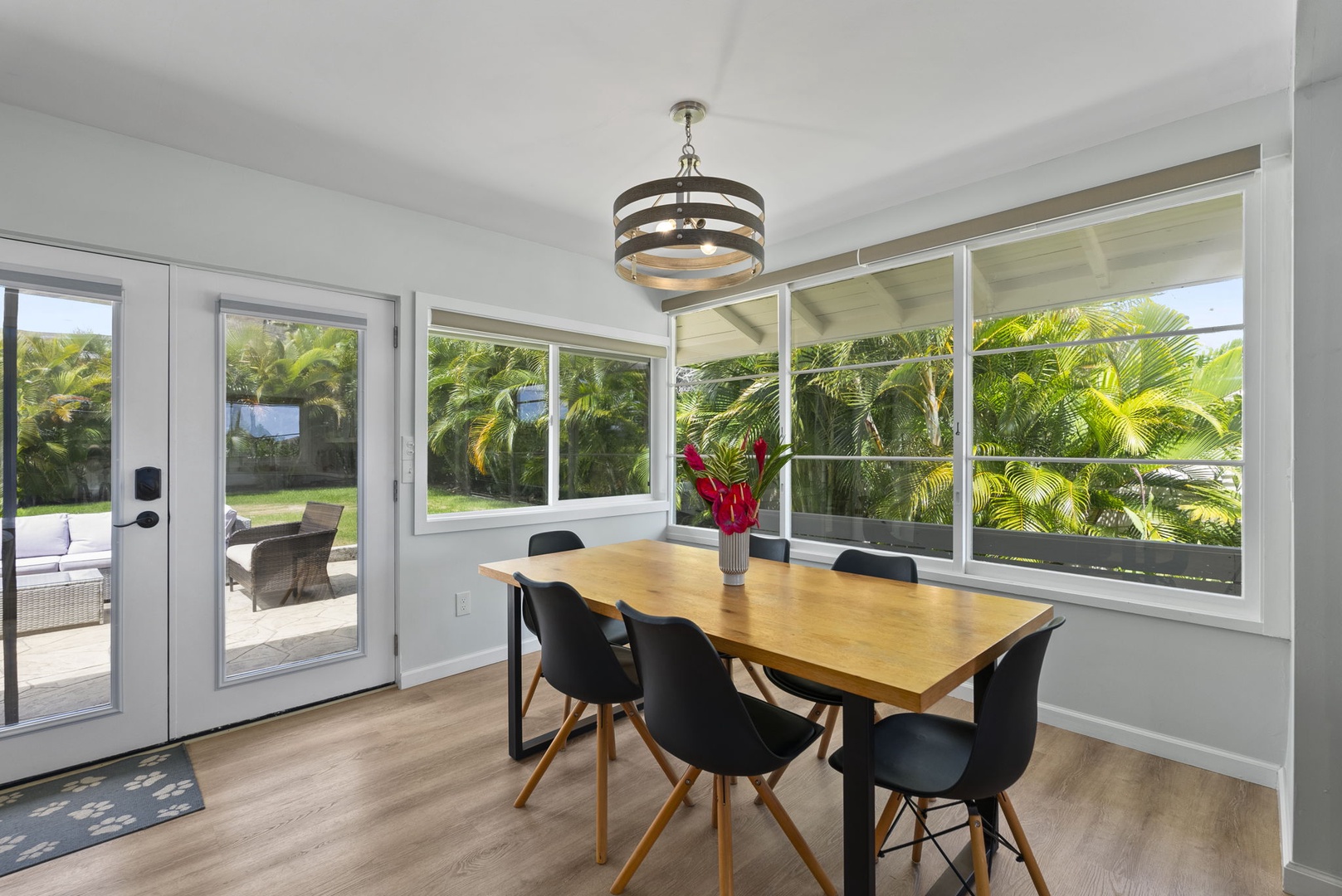 Kailua Vacation Rentals, Hale Alapi'i Lanikai Getaway - Gather around this 6-seater elegant dining table surrounded by expansive windows that invite natural light.