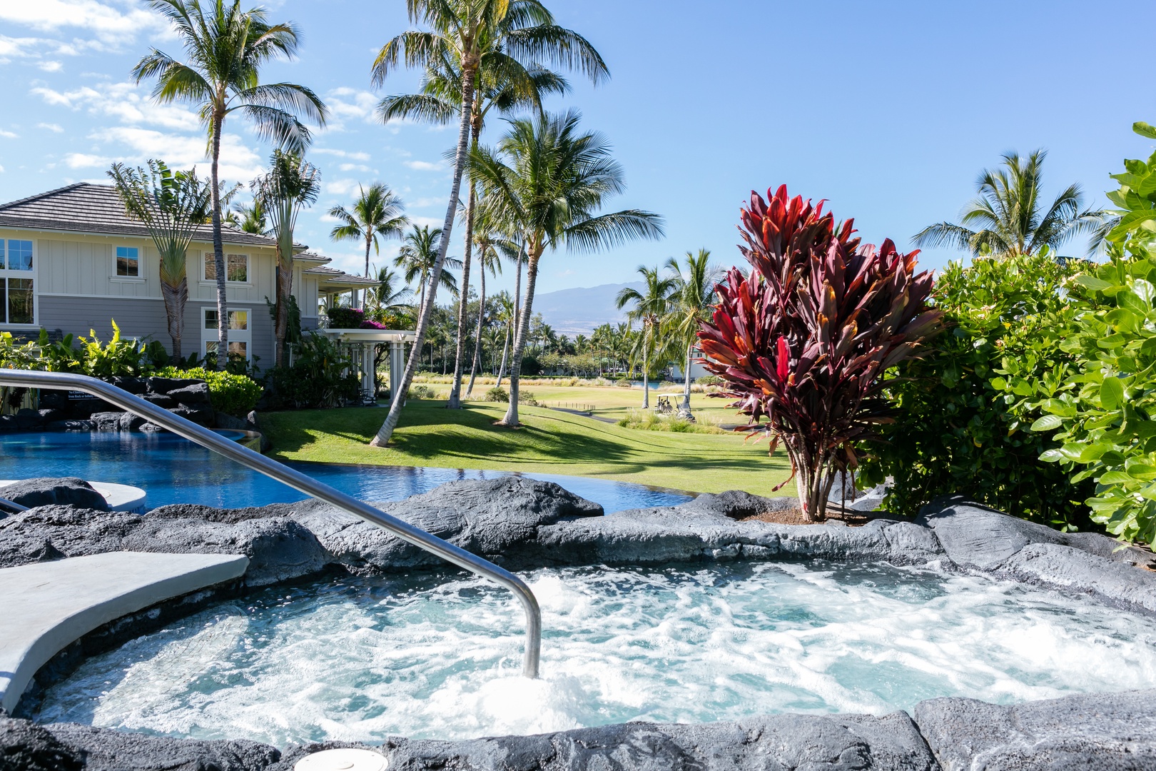 Waikoloa Vacation Rentals, Fairway Villas at Waikoloa Beach Resort E34 - Soothe your muscles in the spa after a day of adventure
