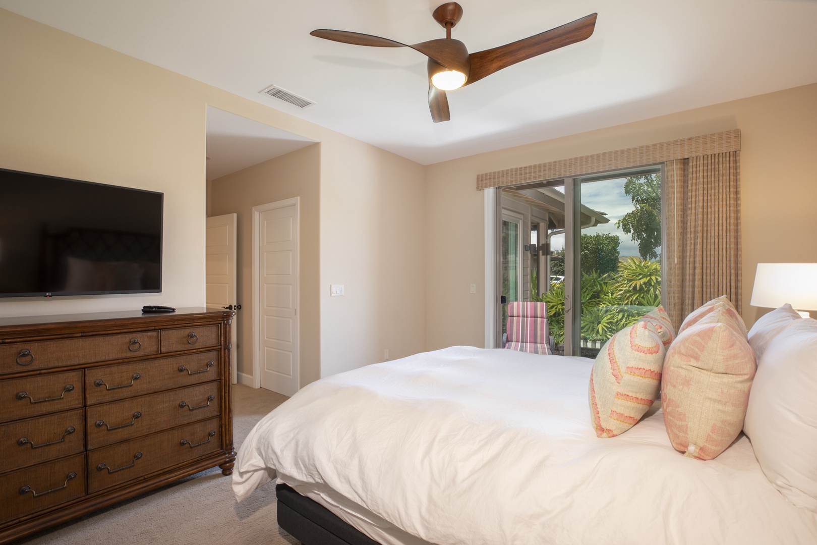 Kamuela Vacation Rentals, Mauna Lani KaMilo #503 - Thoughtfully furnished and inviting, this bedroom offers cool comfort and direct lanai views for a rejuvenating retreat.