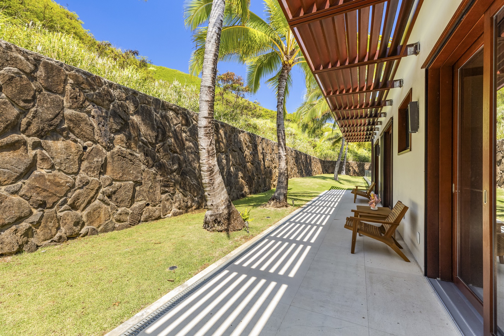 Kailua Vacation Rentals, Lanikai Hillside Estate - Guest bedrooms shared lanai with mountain views.