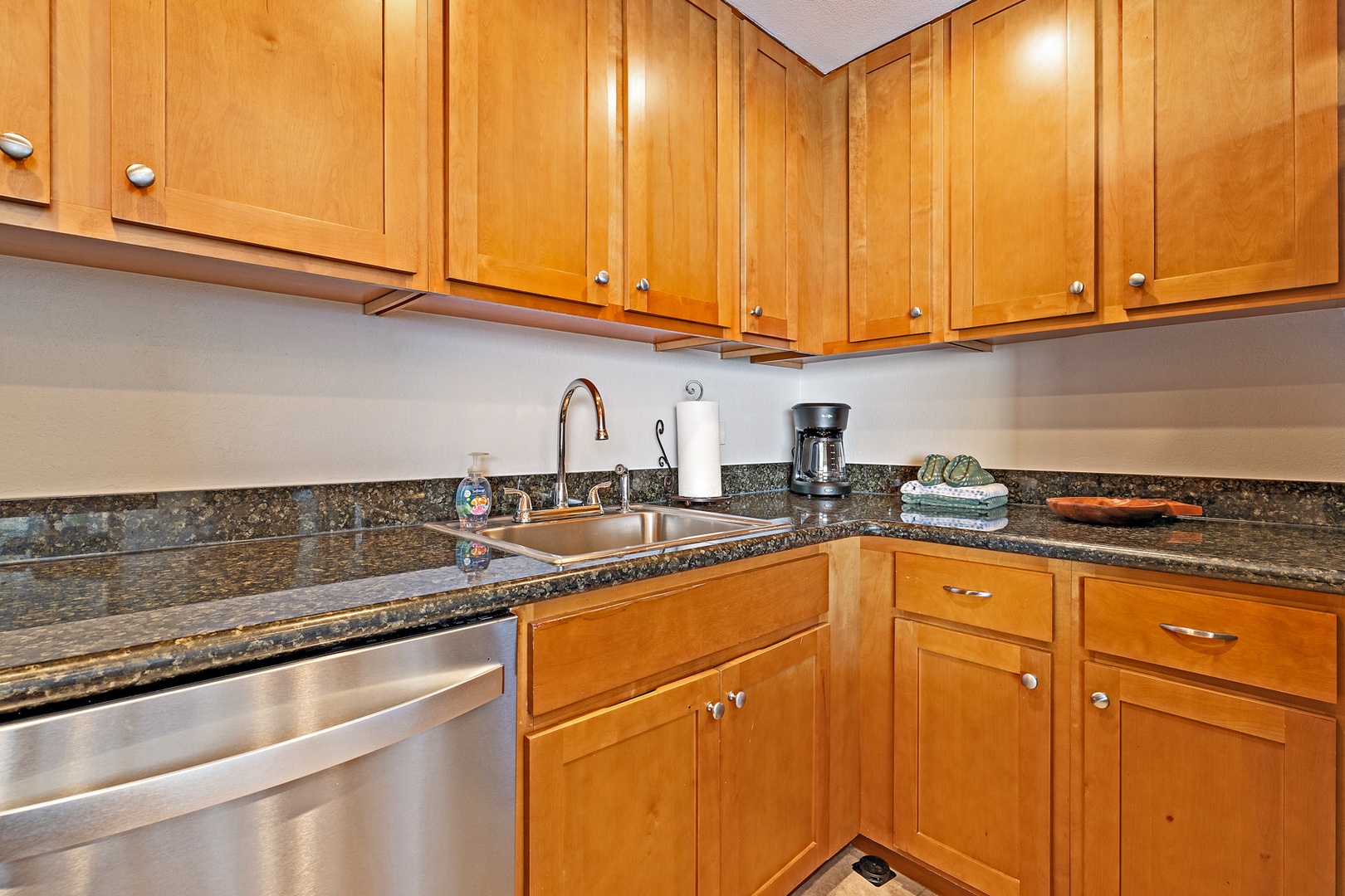 Lahaina Vacation Rentals, Kaanapali Shores 903 - Convenient kitchen space with granite countertops and modern appliances, perfect for quick meal prep or morning coffee.