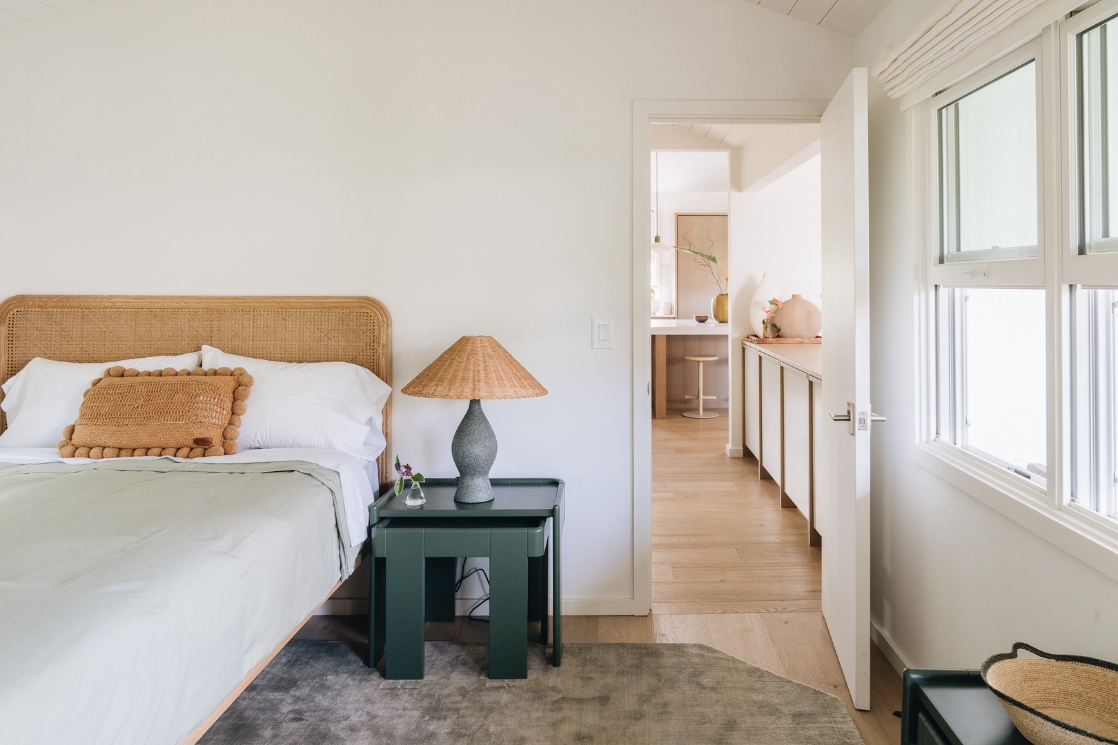 Honolulu Vacation Rentals, Surfside Bungalow** - Crisp linens, warm wood accents, and a relaxed island aesthetic set the tone for restful nights.