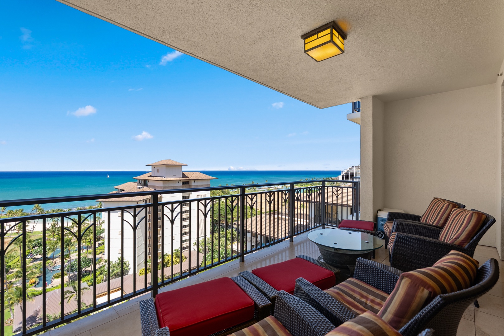 Kapolei Vacation Rentals, Ko Olina Beach Villas O1404 - Stretch out on the lanai loungers with nothing between you and the open water.