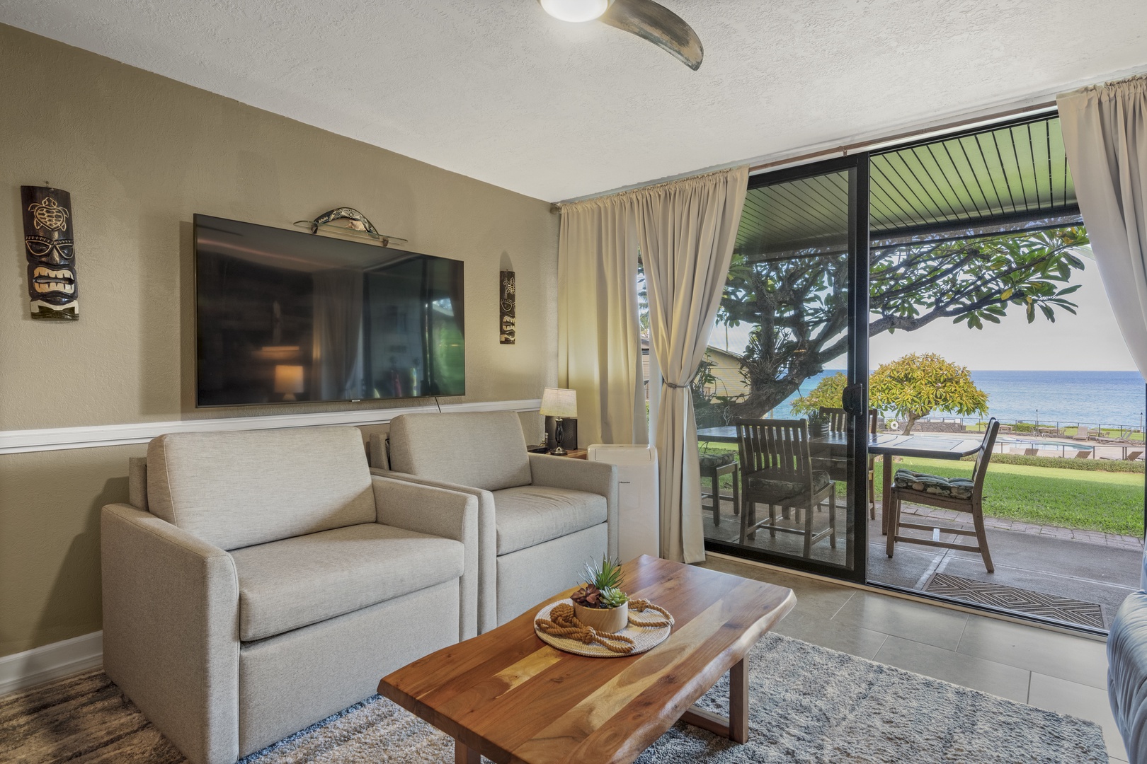 Lahaina Vacation Rentals, Polynesian Shores 114 - Claim a corner of the sofa for the afternoons that the lanai doors stay open.