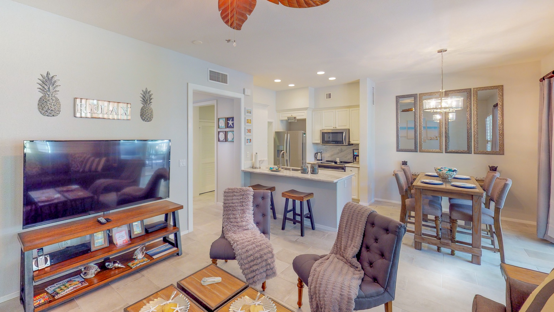 Kapolei Vacation Rentals, Coconut Plantation 1222-3 - This high end condo has an open floor plan for seamless living with kitchen, living and dining areas.