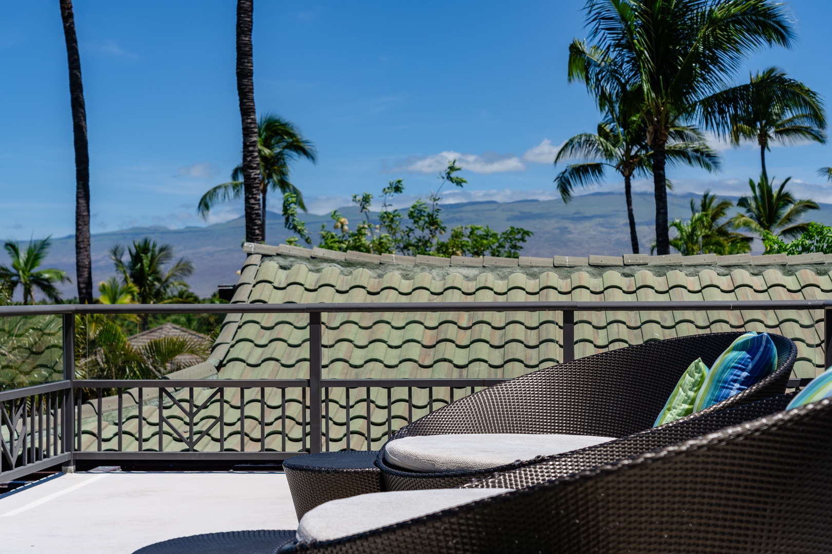 Kamuela Vacation Rentals, Mauna Lani Champion Ridge 22 - Enjoy mountain views from the comfort of the rooftop lounge chairs.