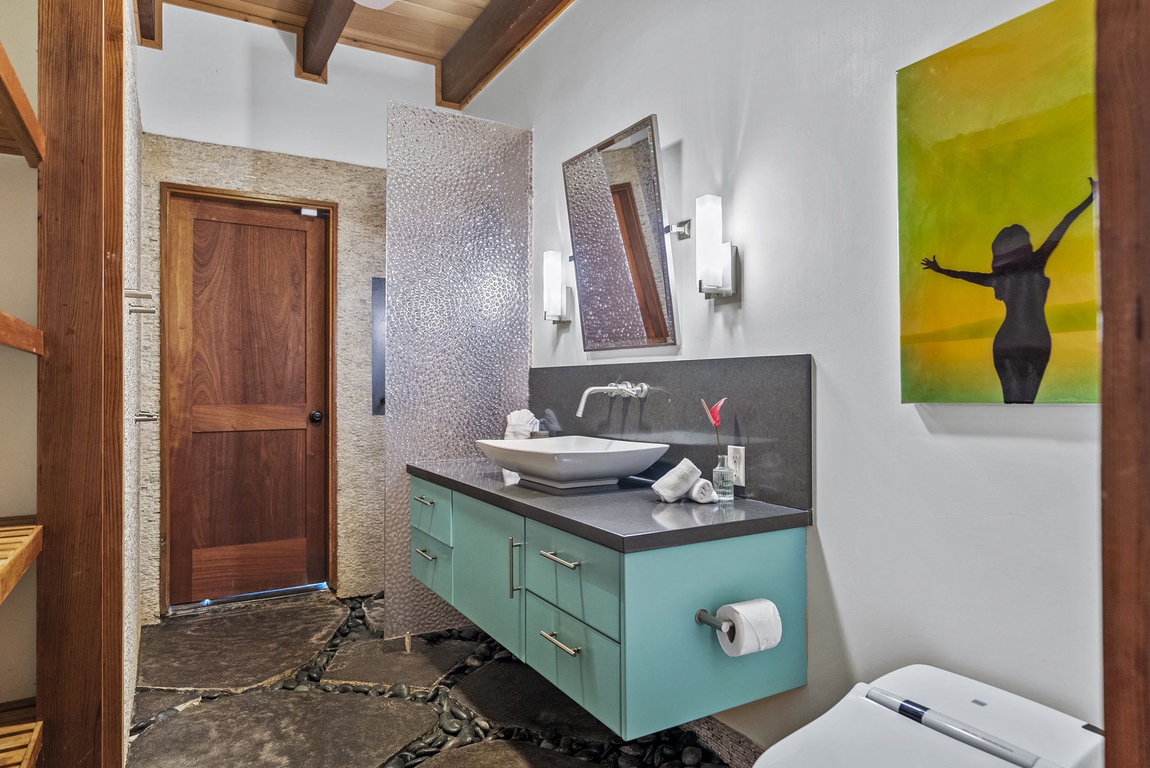 Haleiwa Vacation Rentals, Samurai House - Unique bathroom design with colorful accents and a modern sink.