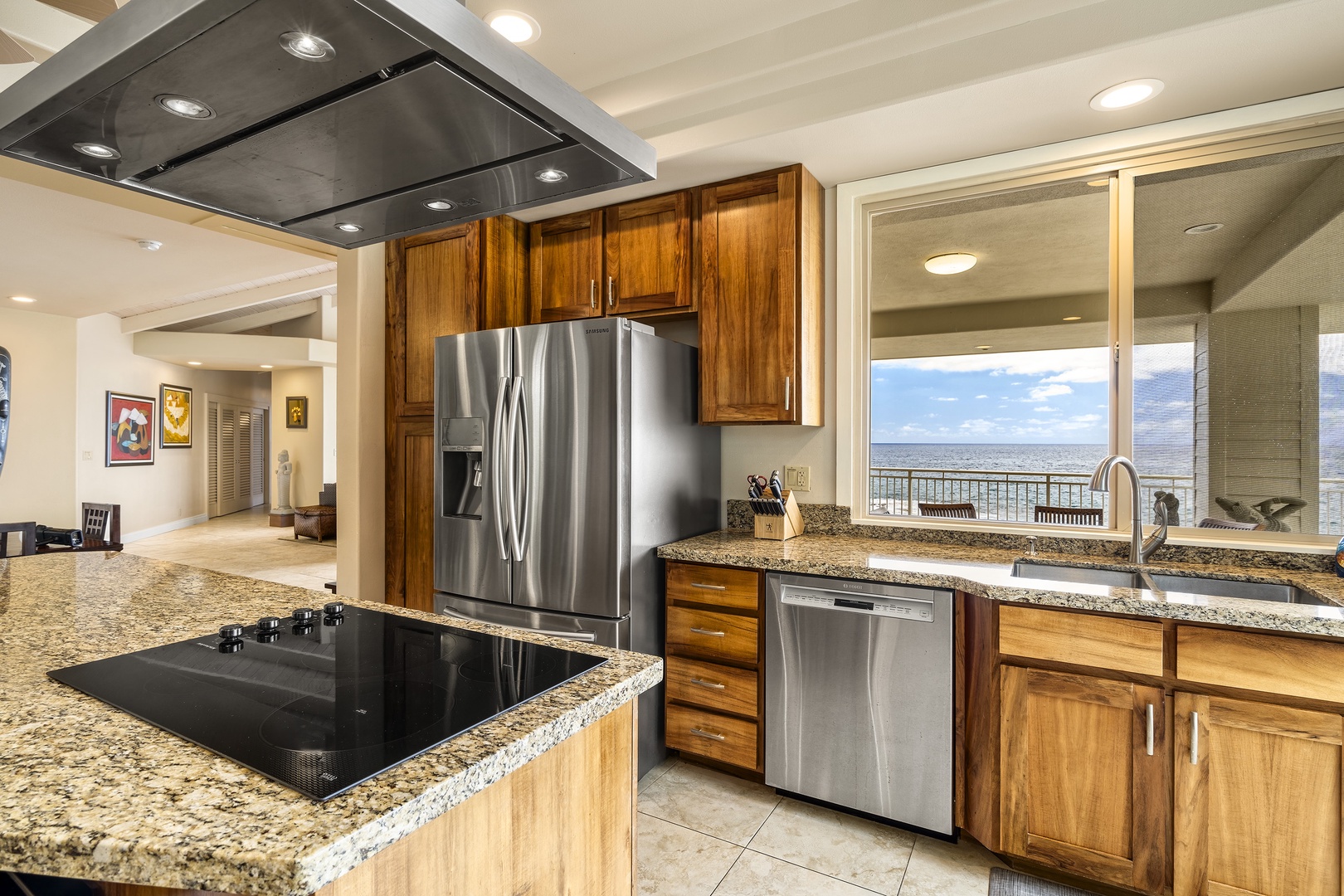 Kailua Kona Vacation Rentals, Ali'i Point #12 - Prepare your favorite meals while enjoying company in this chef-style kitchen with island seating and coastal views.