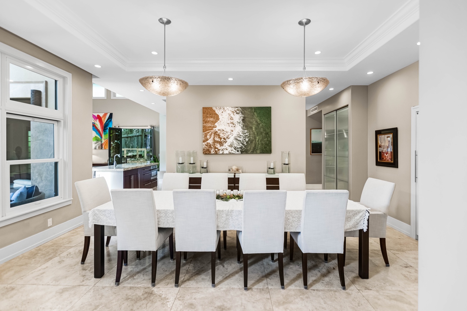 Honolulu Vacation Rentals, Pili Pono - Elegant dining room with contemporary style and artful lighting.