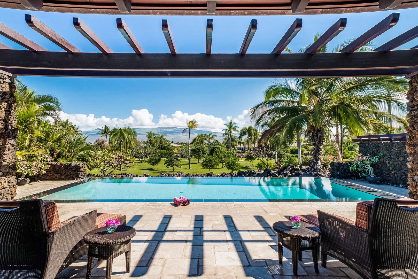 Kamuela Vacation Rentals, House of the Turtle at Champion Ridge, Mauna Lani (CR 18) - The view from the living room opening to the lanai.