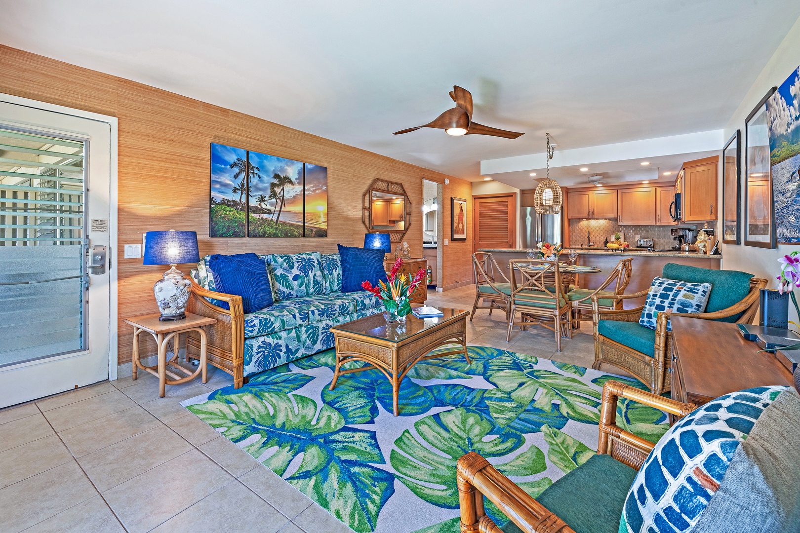 Lahaina Vacation Rentals, Kahana Sunset B4B - The open living space features vibrant tropical décor, comfortable seating, and a seamless flow from the living area to the dining and kitchen spaces.