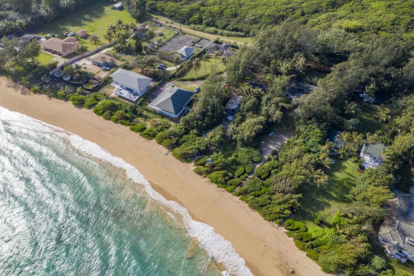 Kahuku Vacation Rentals, Hale Ula Ula - Calm shoreline year round, great for swimming in the summer, or splashing in the winter.