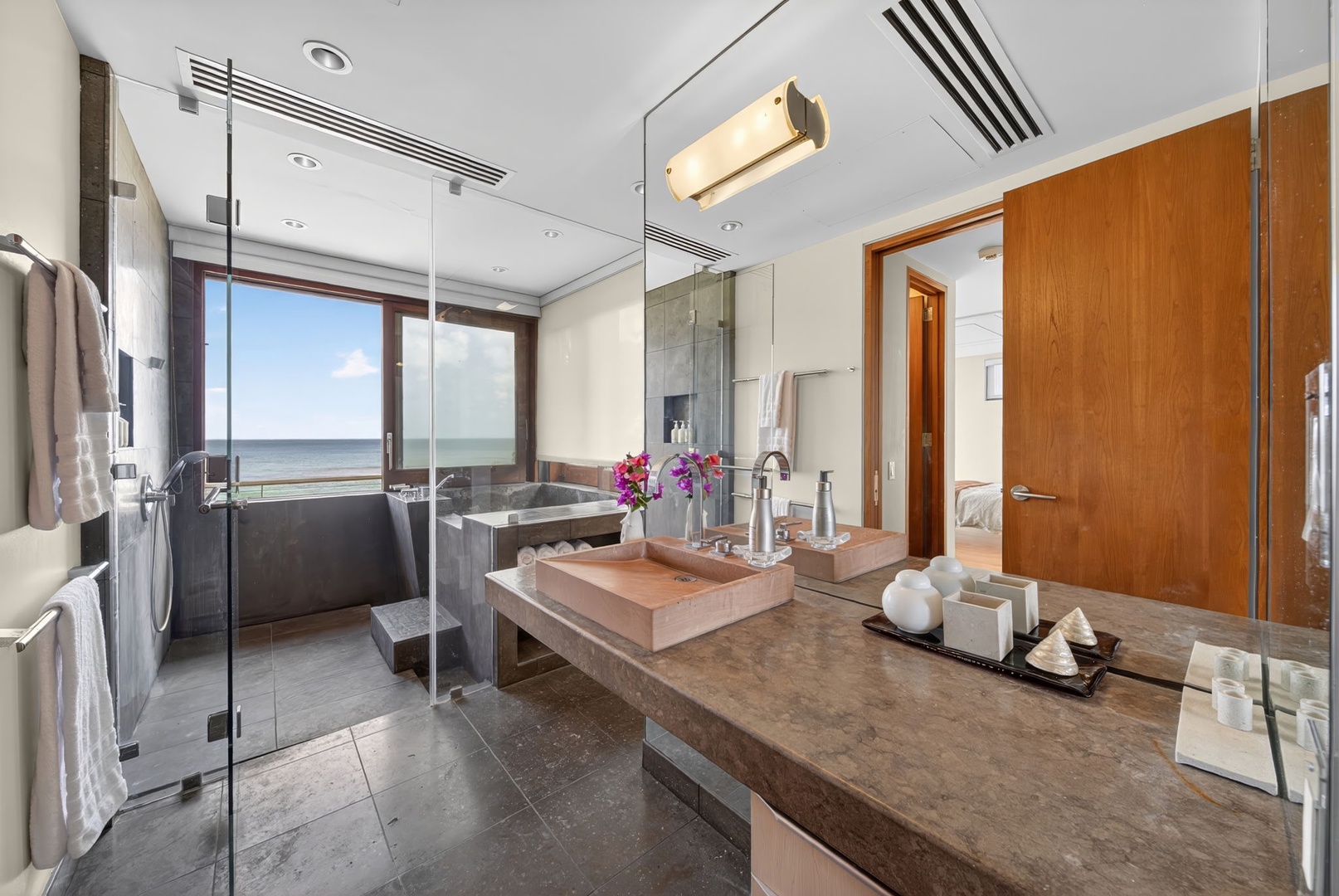 Haleiwa Vacation Rentals, HaleGator - Thoughtfully designed with dual vanities and elegant finishes, this bathroom offers both comfort and functionality.