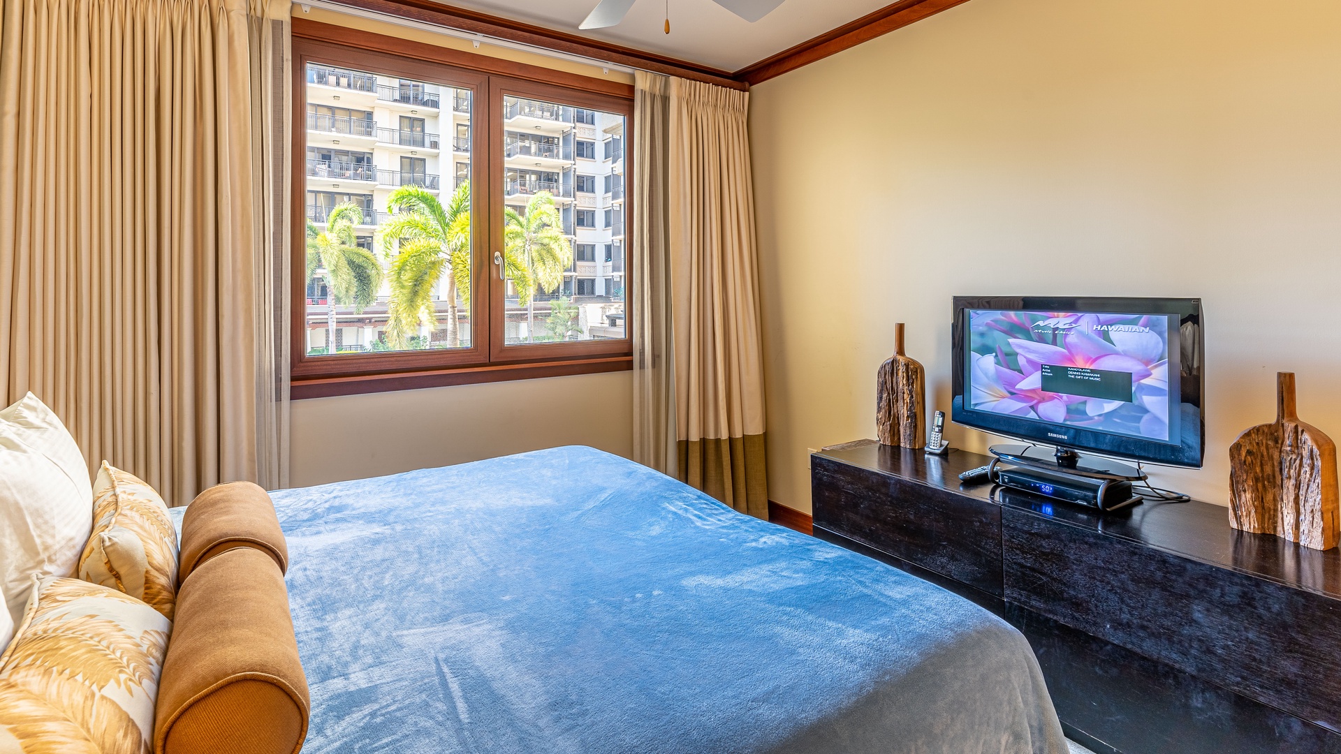 Kapolei Vacation Rentals, Ko Olina Beach Villas O224 - The second guest bedroom showing the twin beds converted and the TV.