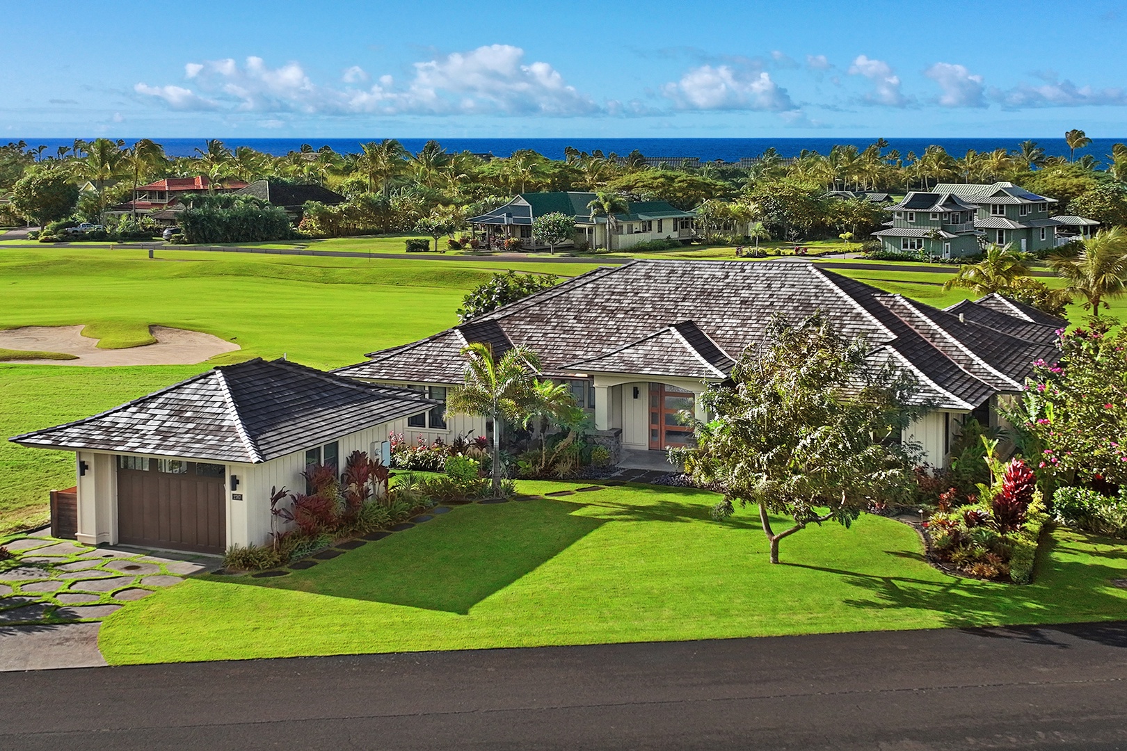 Koloa Vacation Rentals, OFB Hale Mala Ulu - Aerial view of the property immersed in green paradise