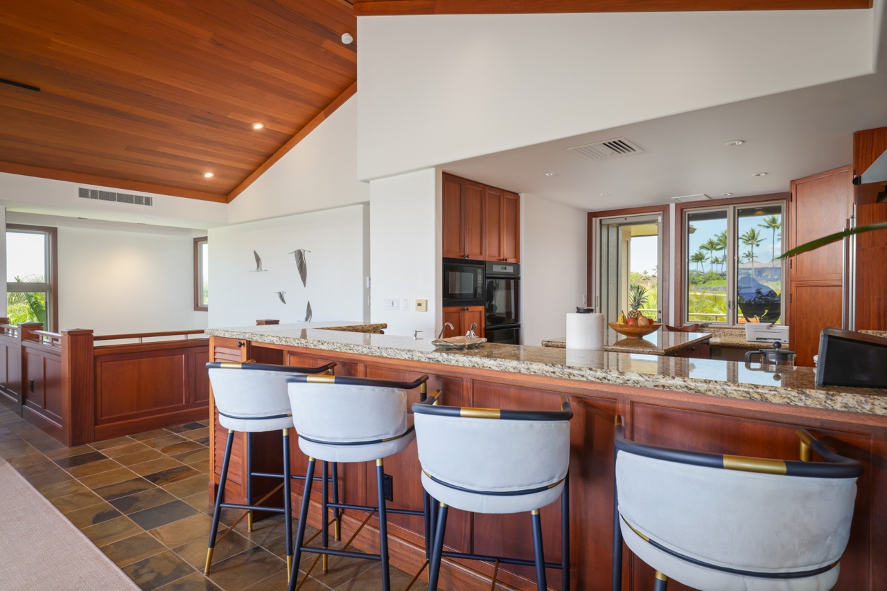 Kailua Kona Vacation Rentals, 3BD Ke Alaula Villa (217C) at Hualalai Resort - Bar seating at the kitchen counter for a moring coffee or visiting with chef!