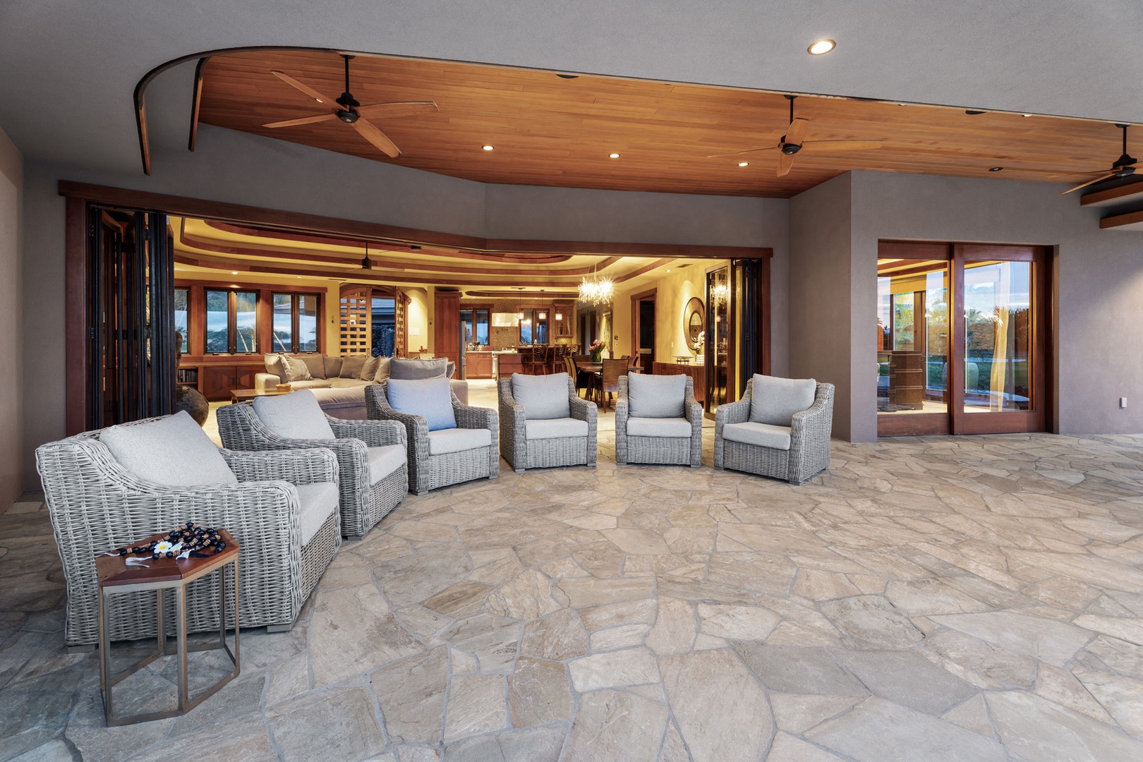 Kamuela Vacation Rentals, Hale Konane - Enjoy shaded comfort in the lanai seating area with poolside views.