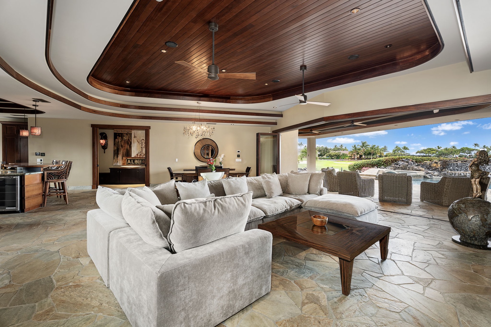 Kamuela Vacation Rentals, Hale Konane - Spacious great room with seamless indoor-outdoor living and upscale island design.