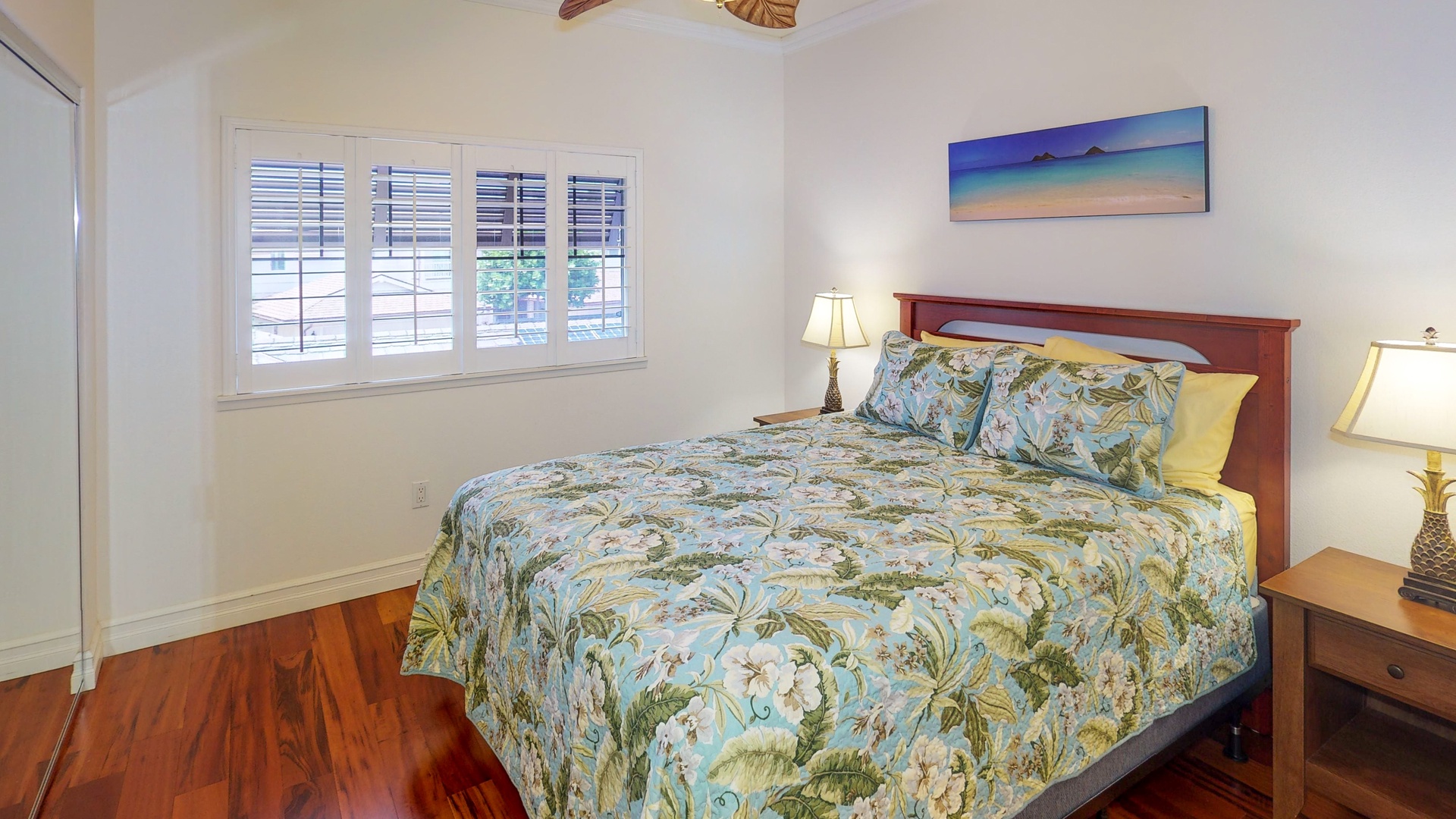 Kapolei Vacation Rentals, Coconut Plantation 1200-4 - The guest bedroom has queen size bed, ceiling fan and natural light.