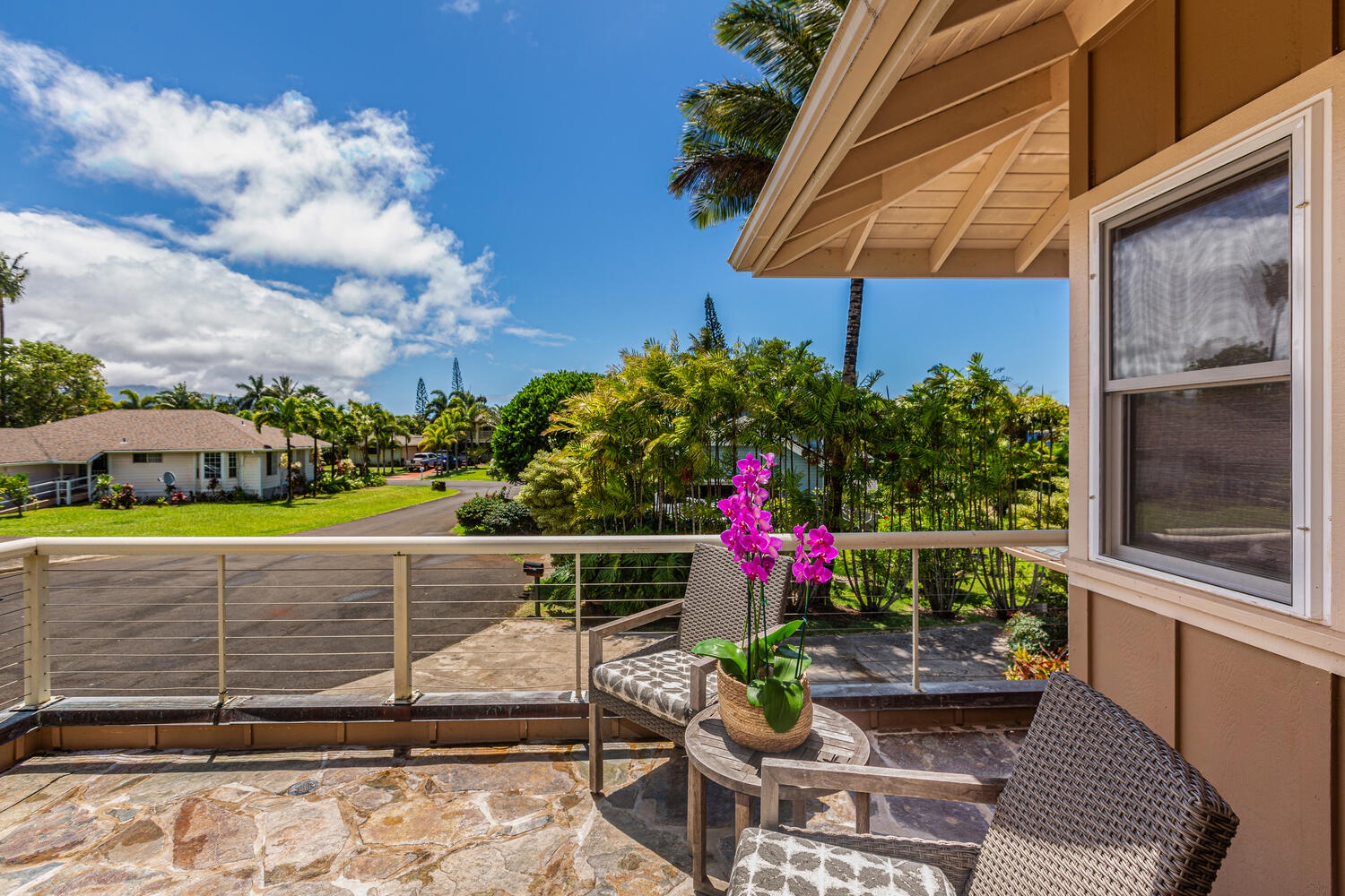 Princeville Vacation Rentals, Pohaku Villa - Enjoy your morning coffee on the primary suite's lanai.