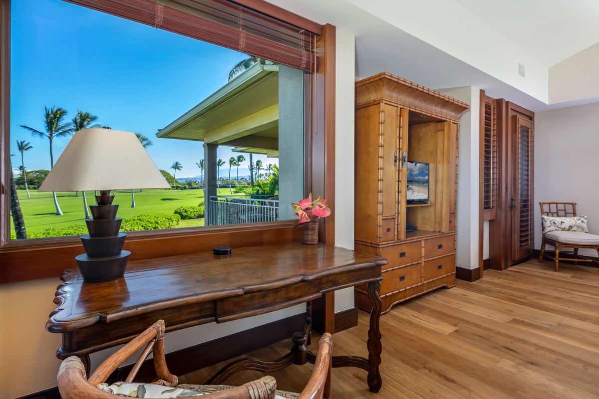 Kailua Kona Vacation Rentals, Fairways Villa 120A - Your elegant living space frames stunning golf course and tropical views through expansive windows, creating a serene Hawaiian retreat.