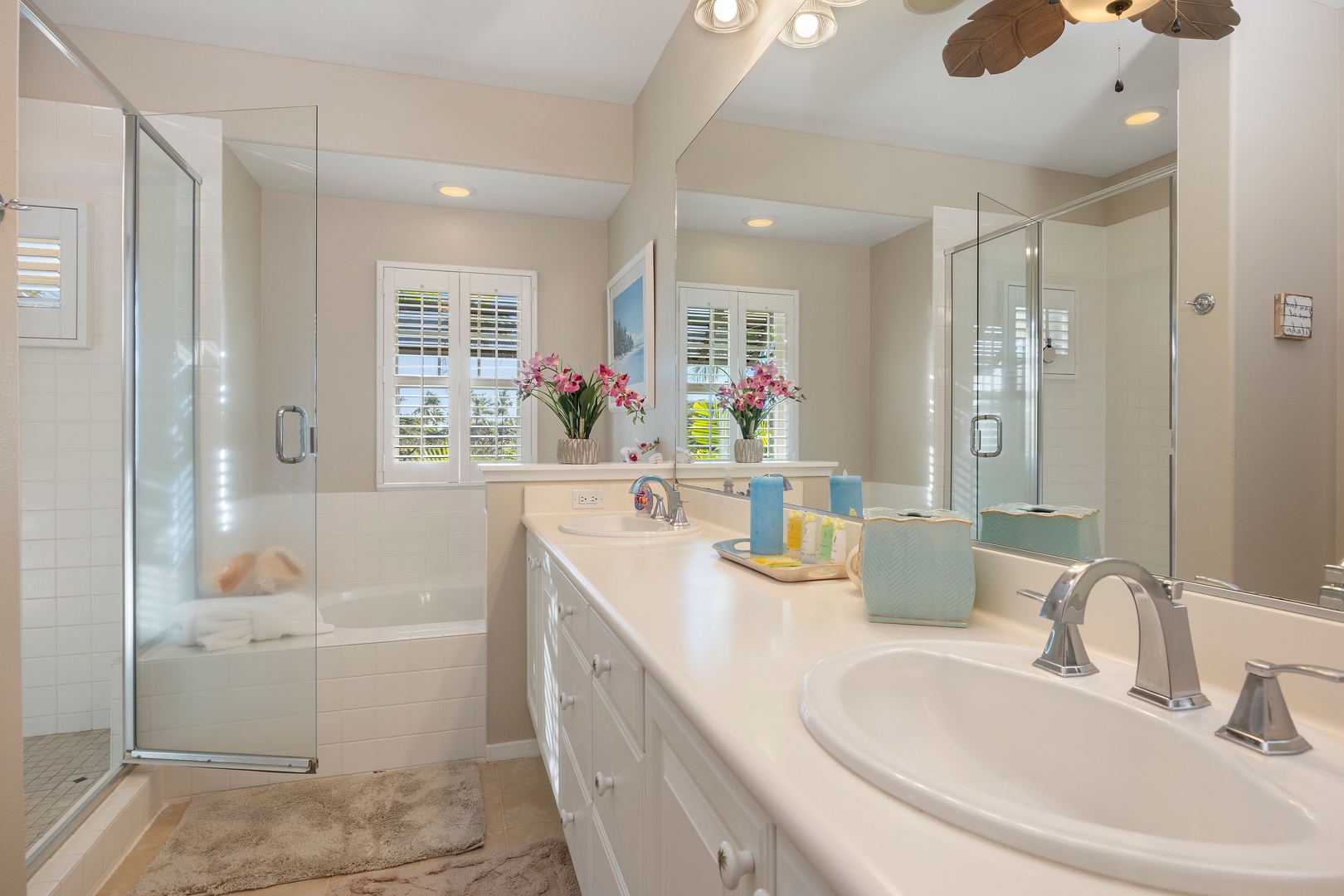 Unwind in your spa-like bathroom with dual vanities, glass-enclosed shower, and soaking tub—your personal retreat.