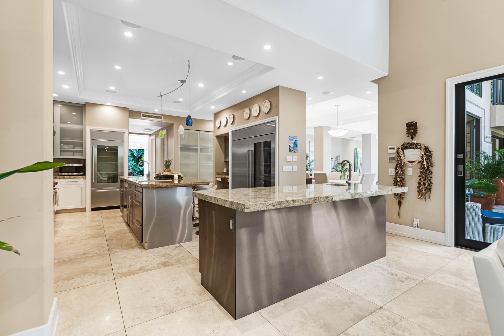 Honolulu Vacation Rentals, Pili Pono - Central island with seating in a modern gourmet kitchen.