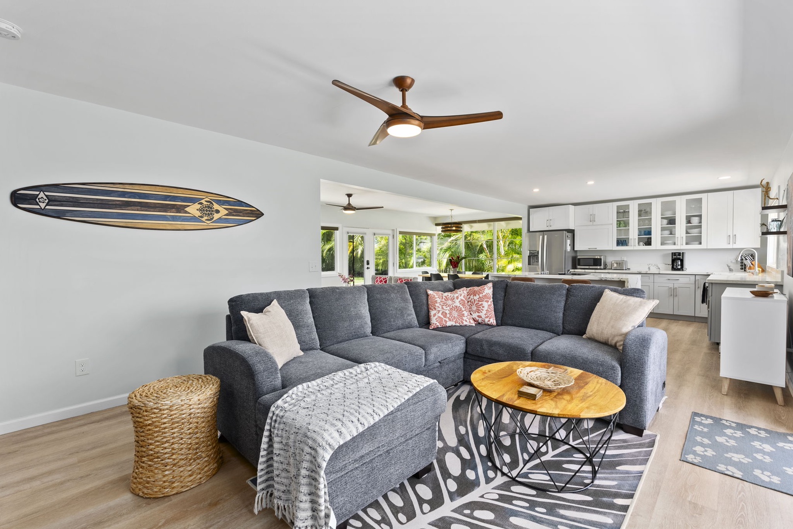 Kailua Vacation Rentals, Hale Alapi'i Lanikai Getaway - Relax in this stylish living area featuring a large sectional sofa and chic accents, creating a perfect spot for gathering