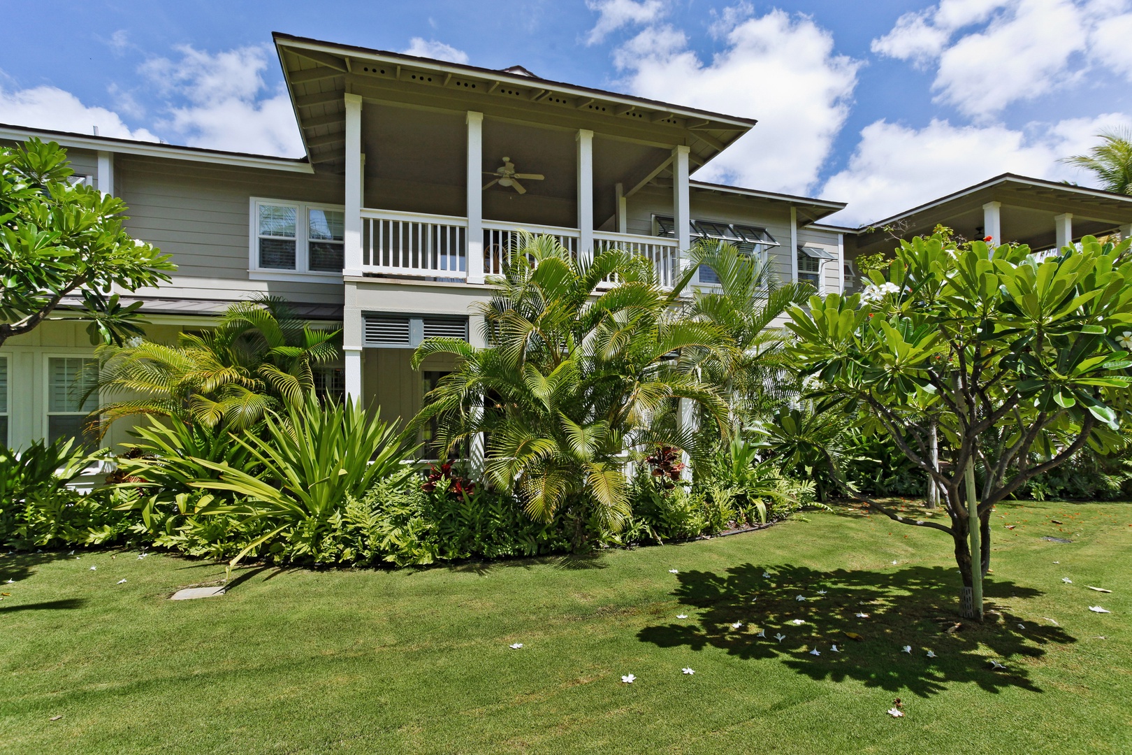 Kapolei Vacation Rentals, Coconut Plantation 1208-2 - Manicured lawns and a private lanai at the condo.