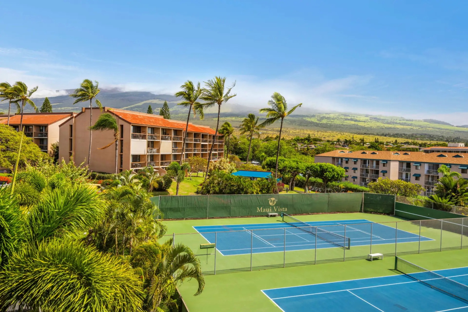 Kihei Vacation Rentals, Maui Vista 2420 - Play a set on the Maui Vista courts, the mountains standing in for a stadium backdrop.