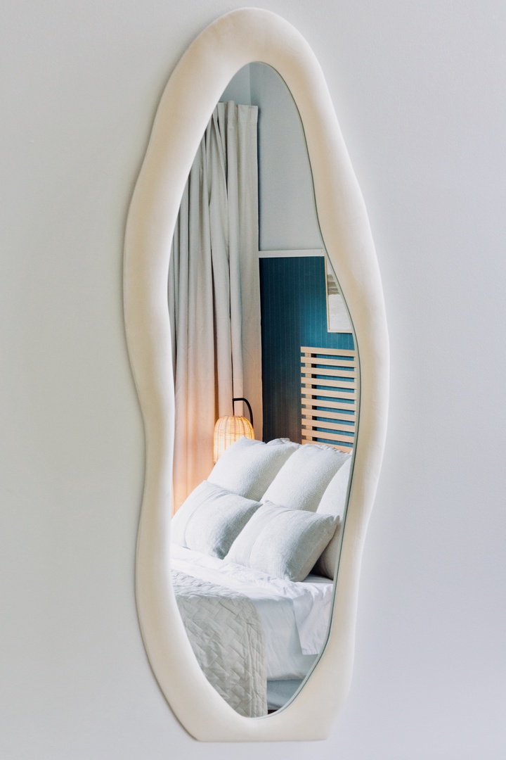 Kailua Kona Vacation Rentals, Keauhou Kai C301 - Warm wood and a soft-edged mirror, small choices that make the room feel considered.