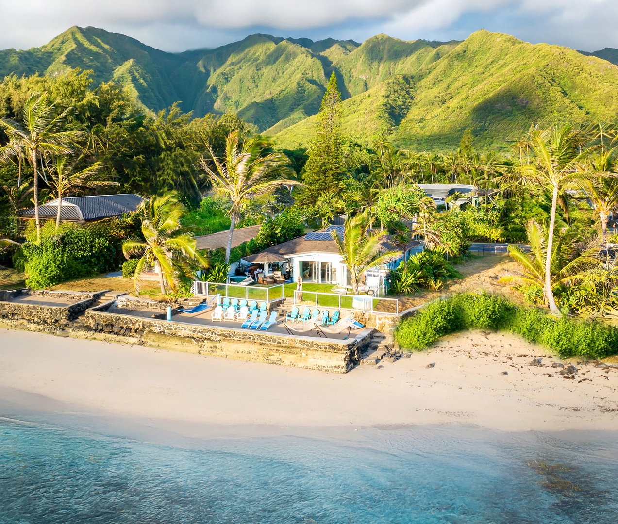 Hauula Vacation Rentals, Private Beach Paradise - From above, the house sits between emerald ridges and the open sea.