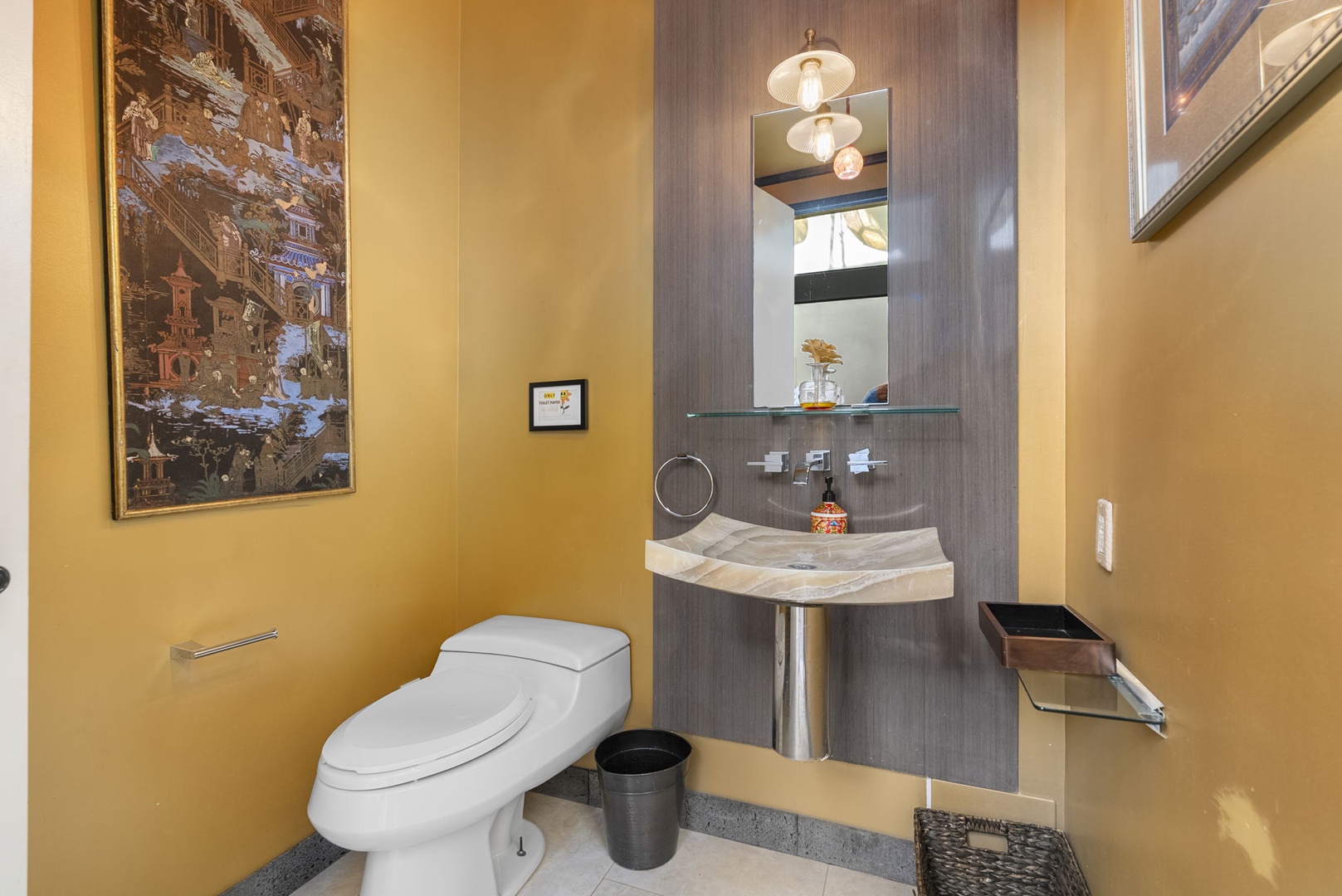 Honolulu Vacation Rentals, Tantalus Glass House (3 BD) - Step into your beautifully appointed powder room featuring elegant marble vanity, contemporary fixtures, and warm golden walls that create a luxurious retreat.